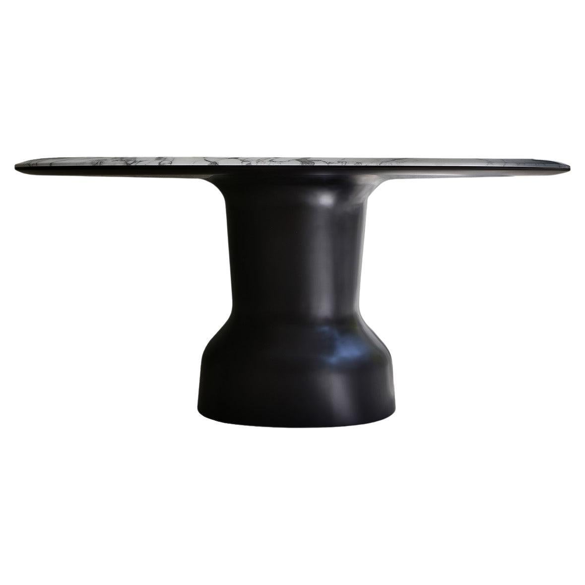 Table Musa, une pièce sculpturale avec plateau en onyx