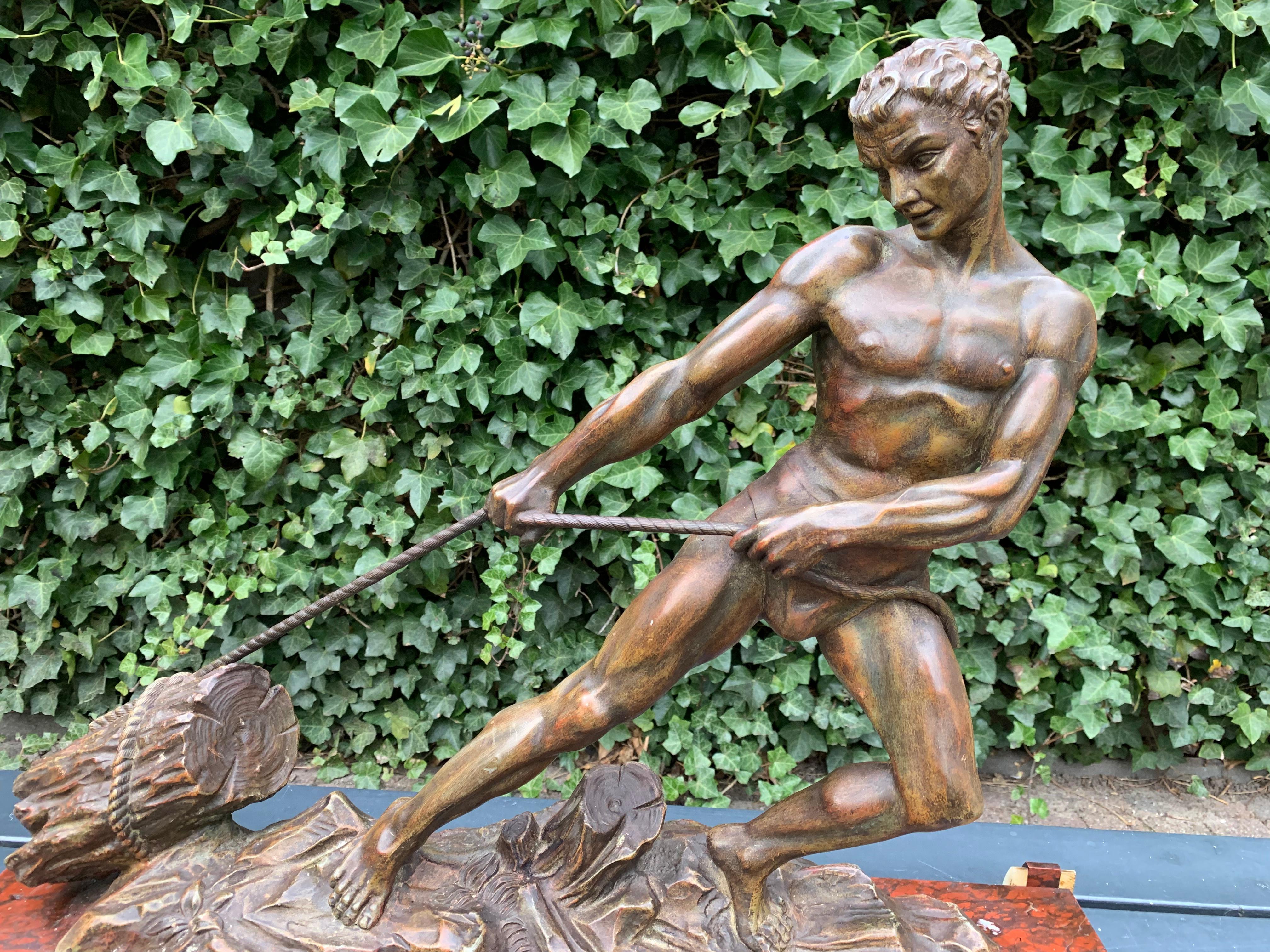 Large Art Deco era sculpture of an athletic male working.

This large and powerful sculpture makes a great centre or desk piece, but it will look beautiful on a side table or credenza as well. The French artist Jean Marie Camus (1877-1955) who also