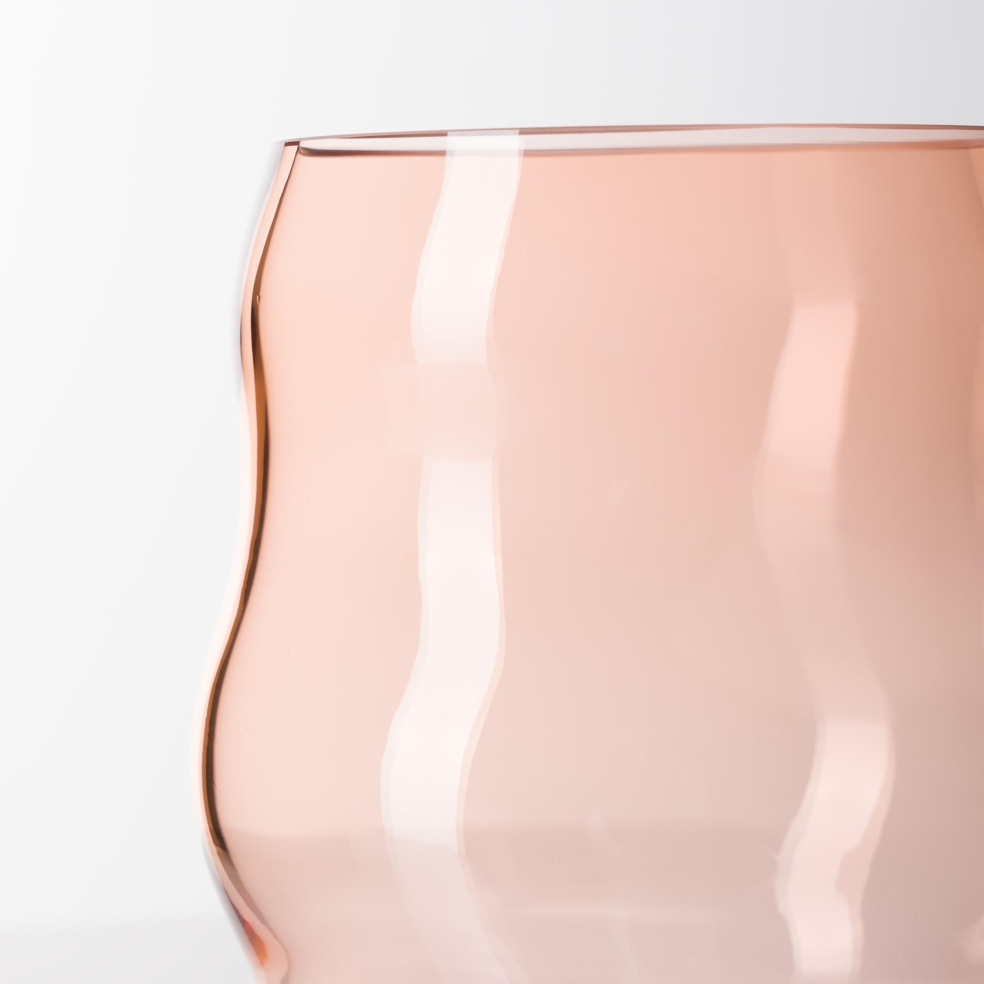 Beauty lies in a reaching for order, but not in grasping it.

These sensuous, full-bodied crystal vases were developed in dialogue with Berlin’s cult florist Marsano and artisanal glassblowers in Bohemia.

Using a combination of formwork and