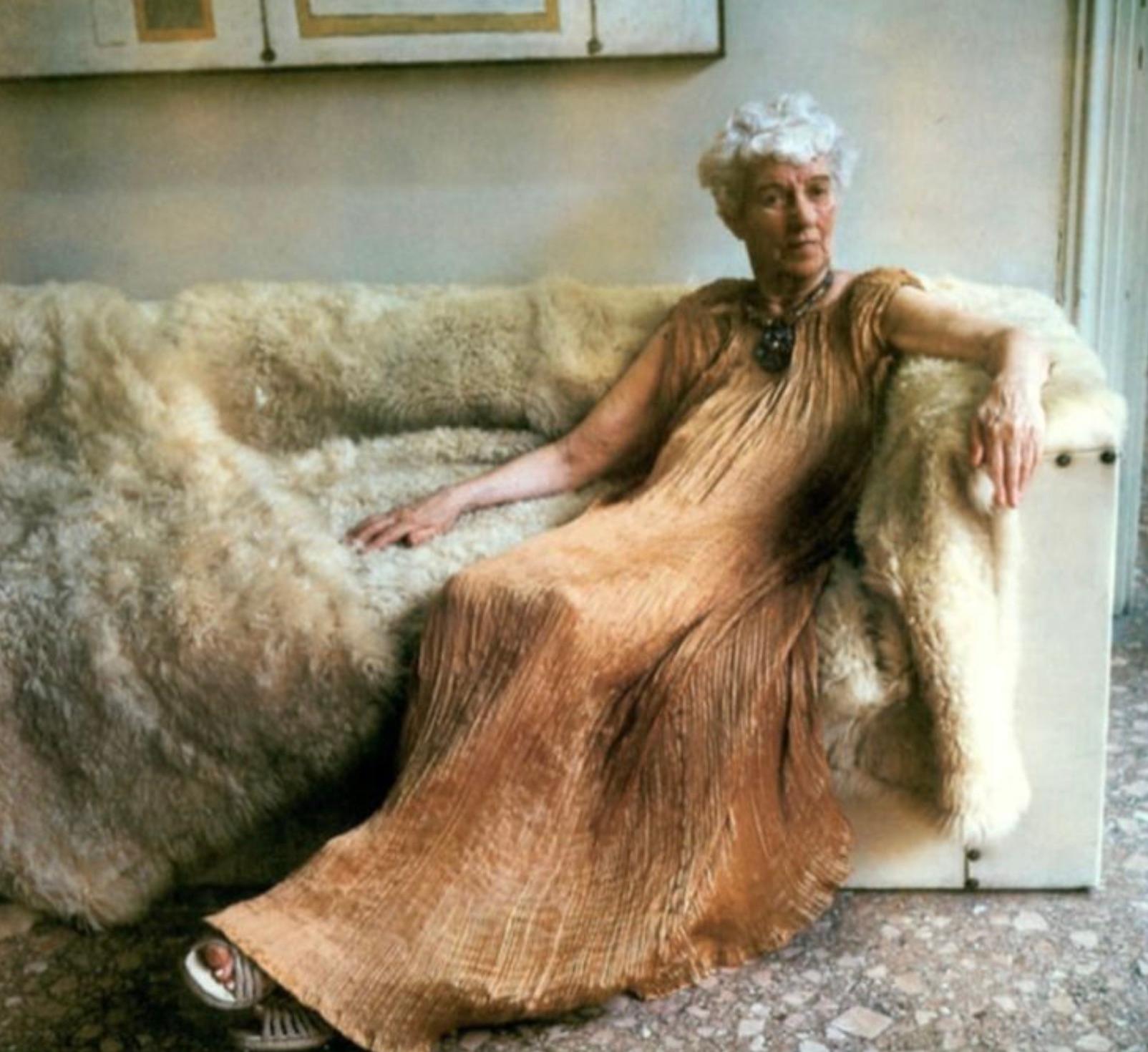This is an exquisite and rare Mariano Fortuny Delphos gown from the 1920s, a true example of early 20th-century couture and textile artistry. The Delphos gown is widely regarded as one of the most iconic and revolutionary garments in fashion