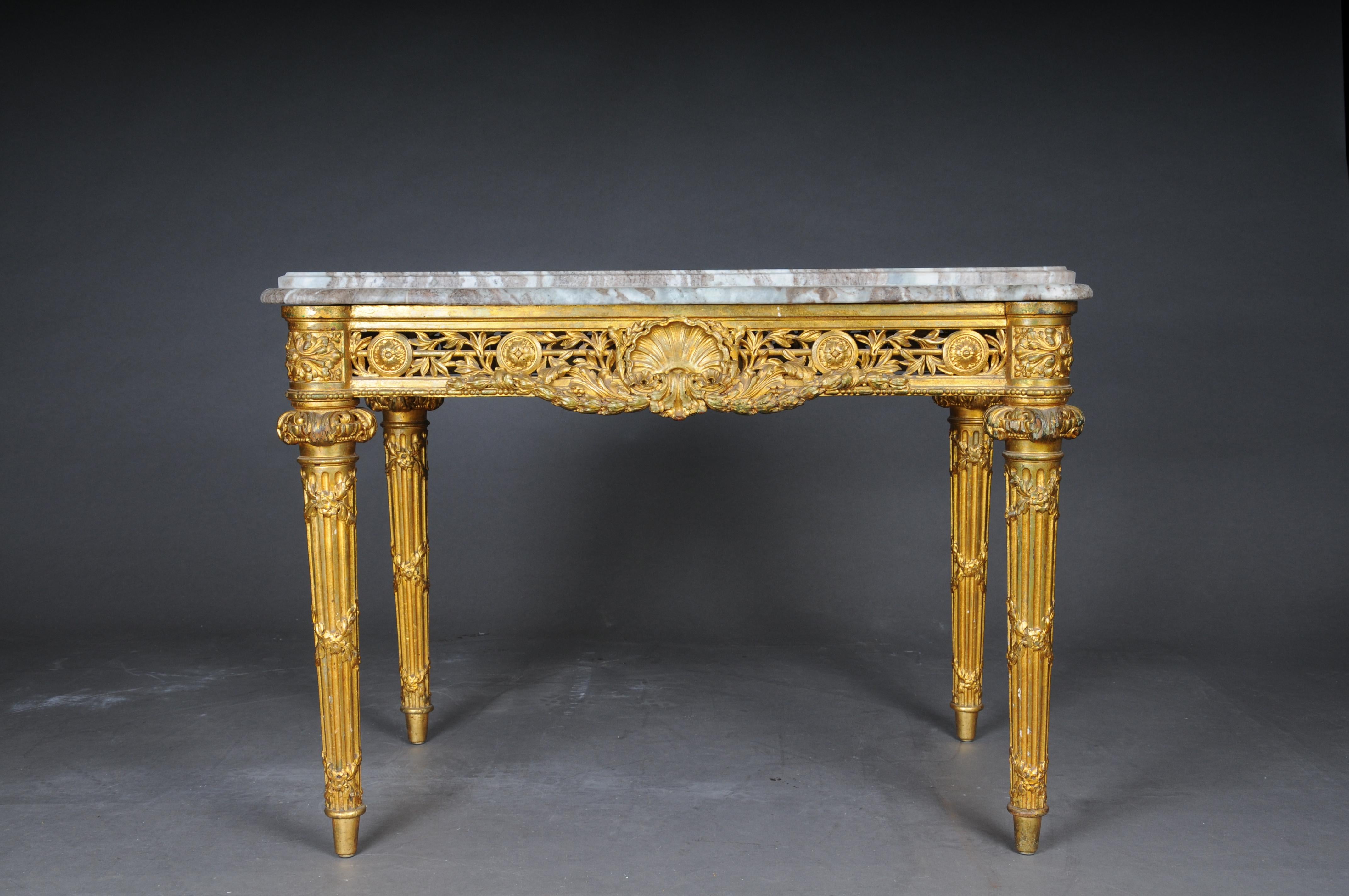 Museum antique coffee table/console table gilded with marble top around 1860, Paris, Louis XVI


Richly carved solid wood body with rich ornaments, finely carved in Louis XVI. Fluted and tapered high legs, richly carved and grooved. Openwork and