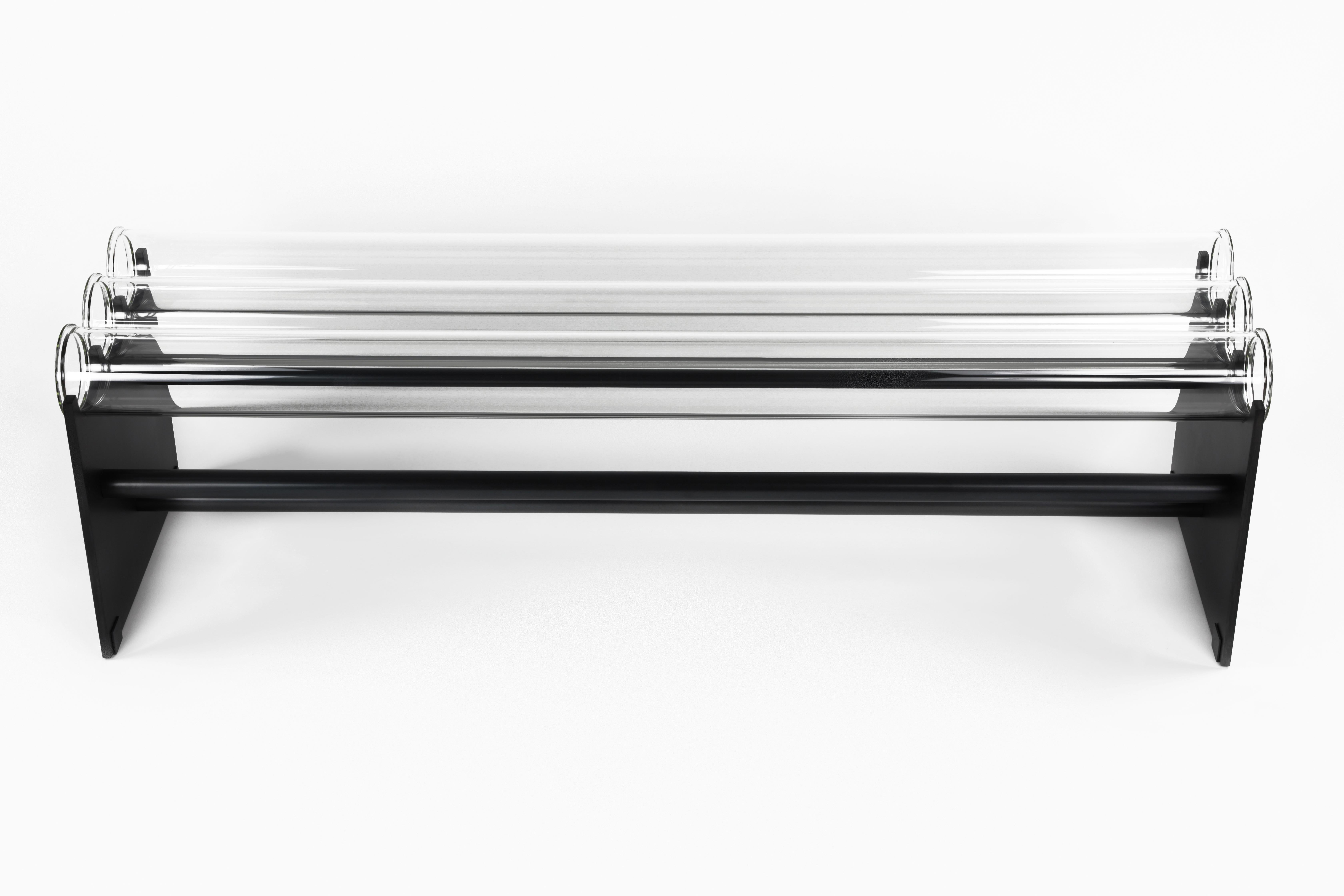 The Museum Bench was originally envisioned to be placed in juxtaposition to art 
to not obstruct the view.
This heavy industrial minimal modern piece is definitely a conversation starter. 
It's made of commercial grade glass pipes strong enough to