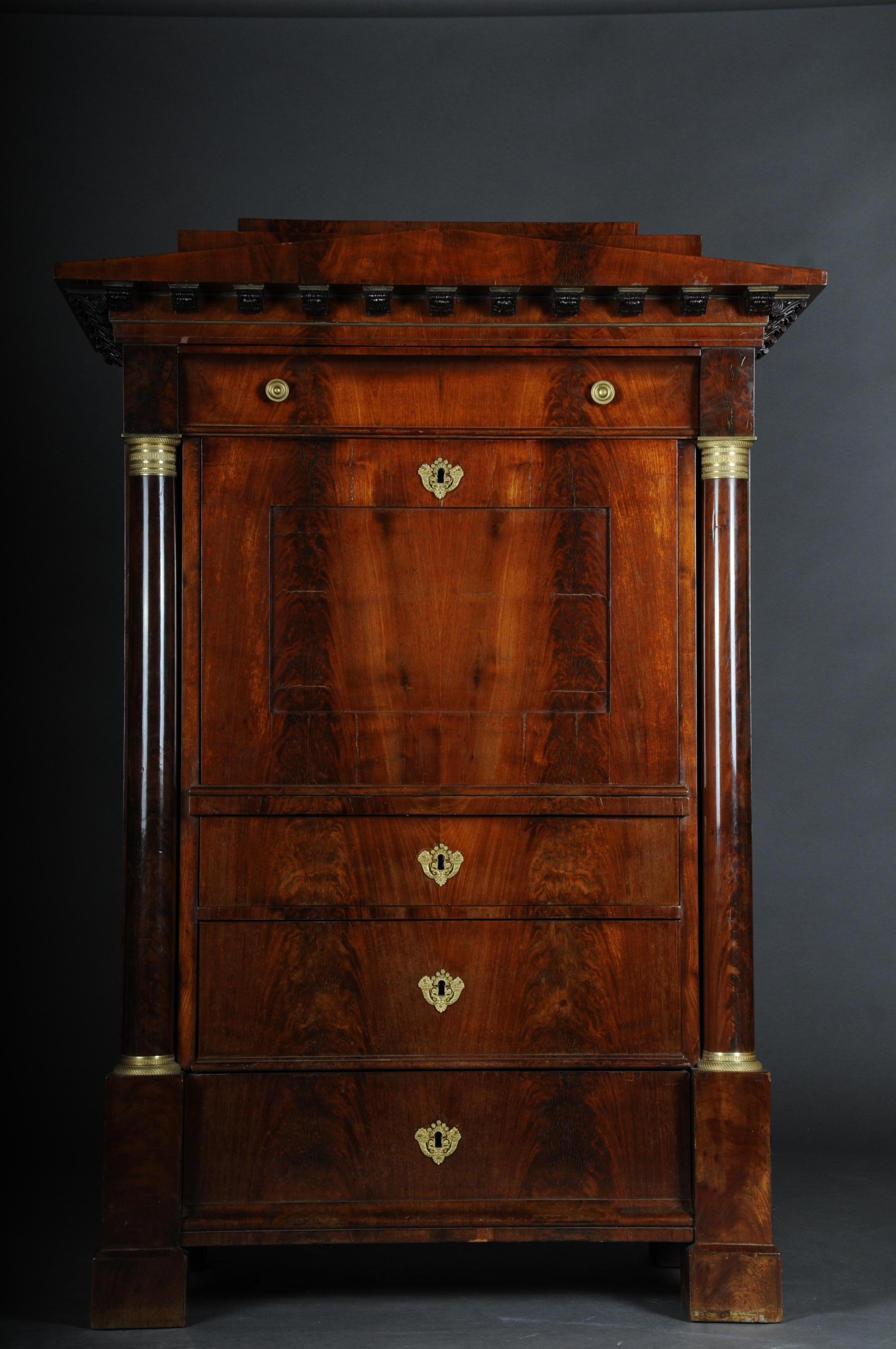 Museum Biedermeier secretary signed by Adolph Friedrich Voigt, circa 1825

Fire-gilt fittings. High quality Cuba mahogany on solid linden wood. Architecturally structured front. Rectangular body on block feet. Provided with three drawers of