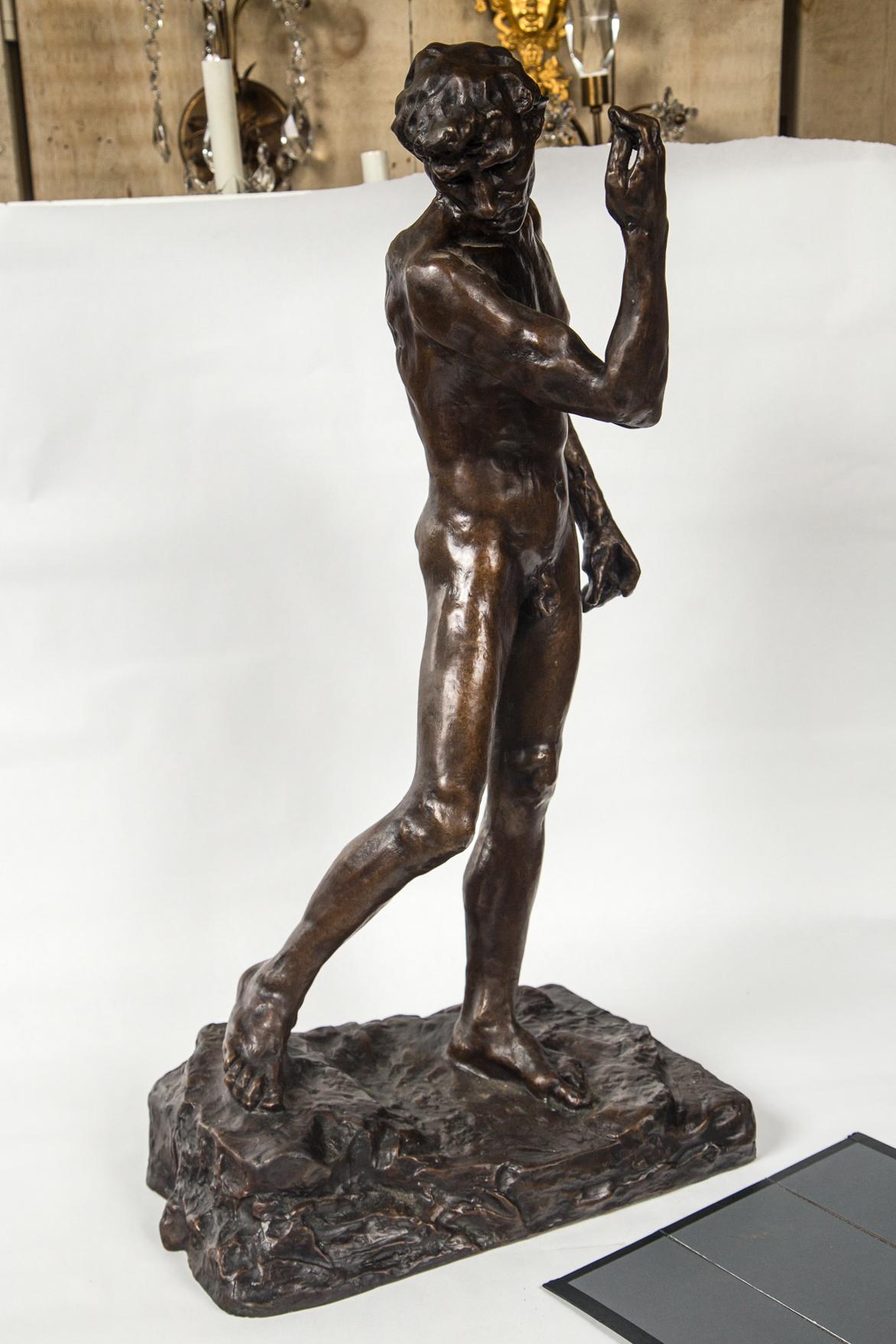 Dark patinated bronze in a striding position.
Stamped muse rodin 1955.