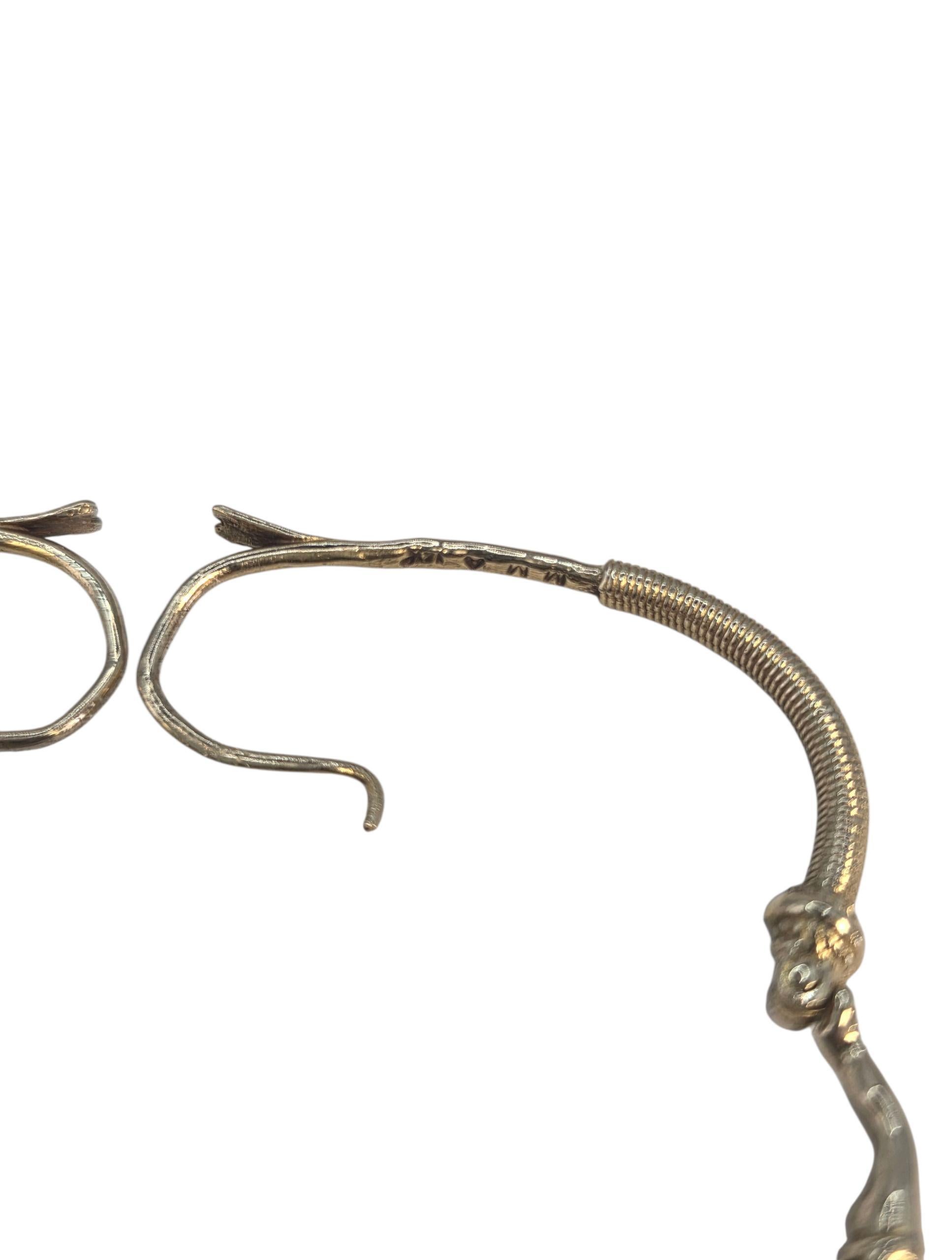 Musée d'art moderne Boucles d'oreilles grecques en or jaune 14K Ange Fée 

Ces boucles d'oreilles sont une réplique de l'art grec ancien exposé au MMA dans les années 1980. 

Poinçon : 14k MMA

Poids : 8.6g / 5.5dwt

Taille : 30.6mm X 6mm / environ