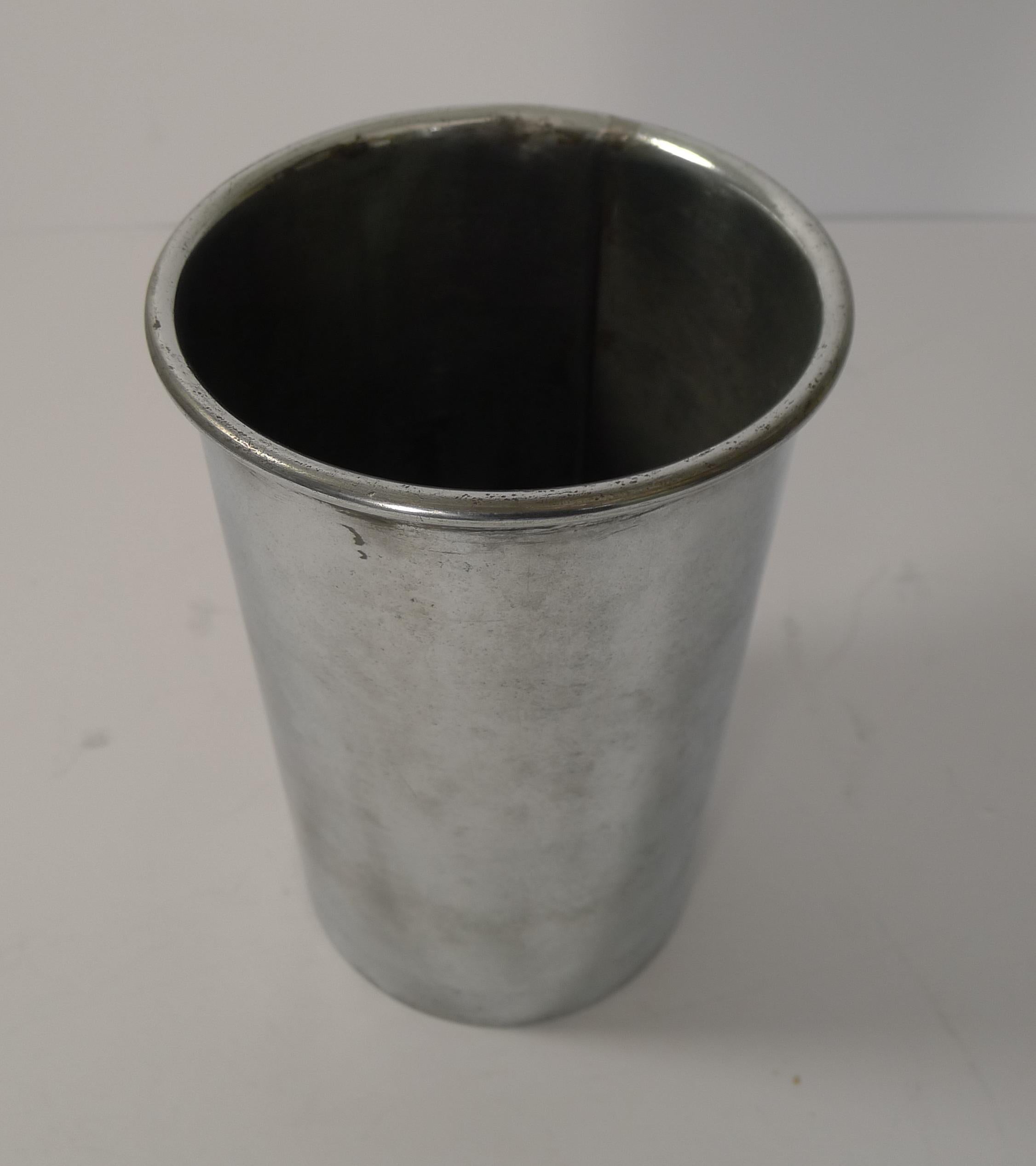 A magnificent Christofle et Cie large Champagne bucket, dating from the 19th century, this is a rare early top-notch example dating to the late 19th century.

It comes complete with the original zinc bottle liner. The handles are beautifully