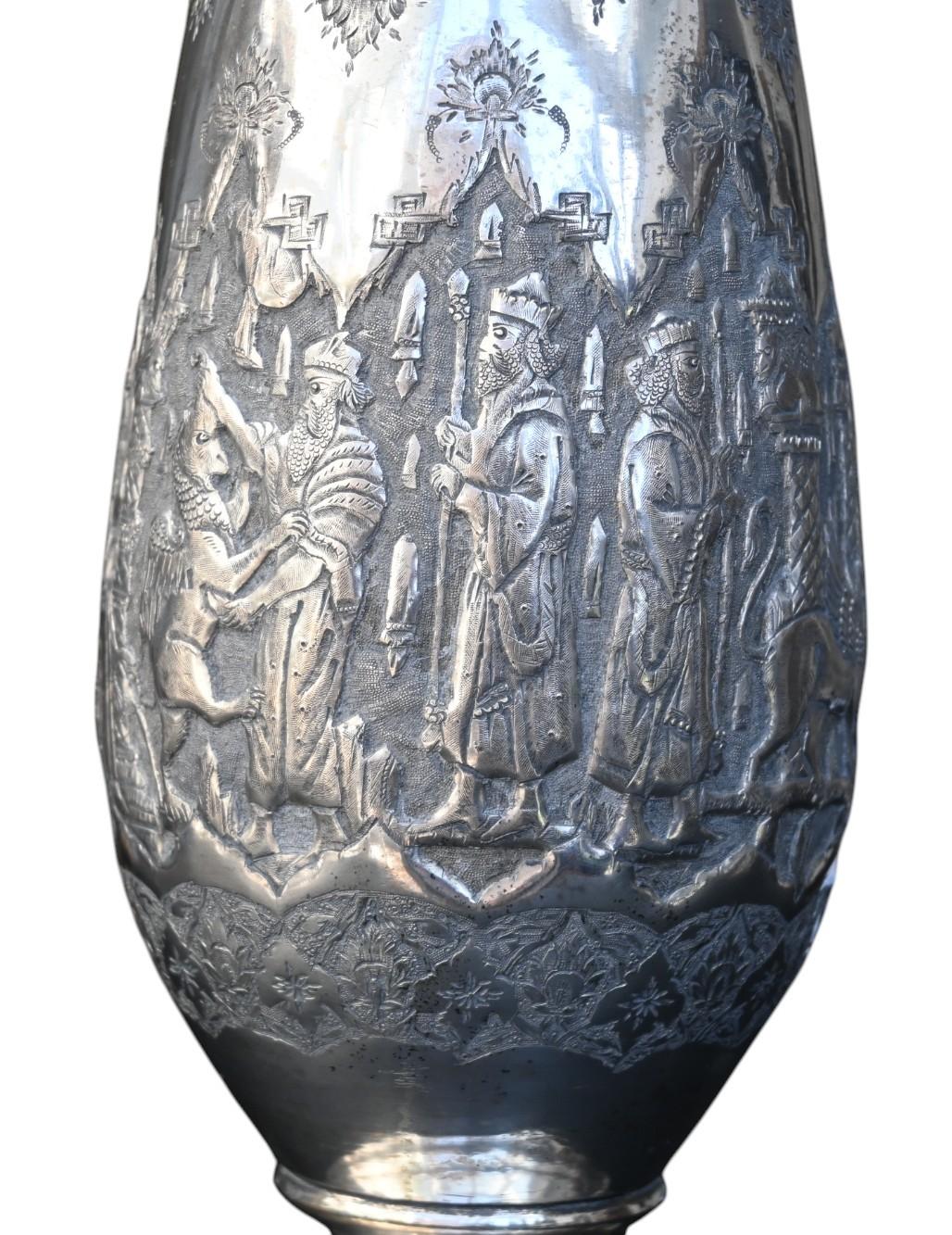 A museum quality antique silver vase from the end of the 19th century . 
This heavy sterling silver  vase is fully decorated and engraved with a  breathtaking  arabesque design with a trumpet opening . 
Small silver hallmark in the base
Total heigth