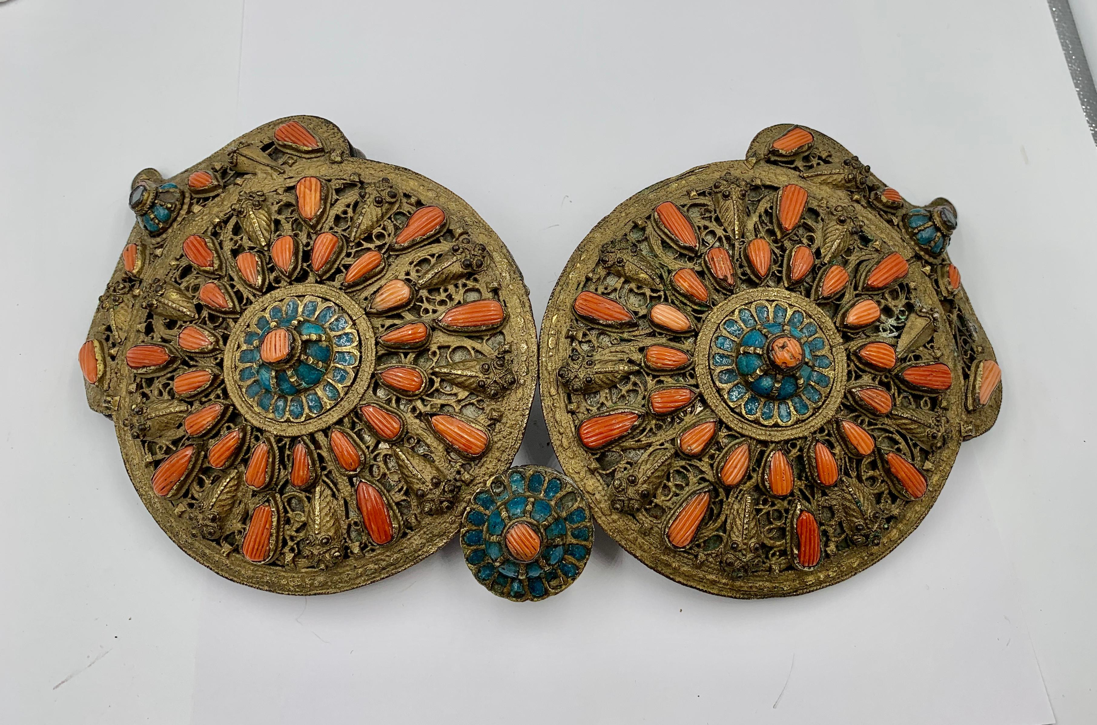 A Museum Quality silver-gilt belt buckle with enamel decoration, and teardrop shaped coral and dating to circa 1830, from Saframpolis (Safranbolu) in the Pontos of Greece, present day Turkey.   There is a similar buckle in the collection of the