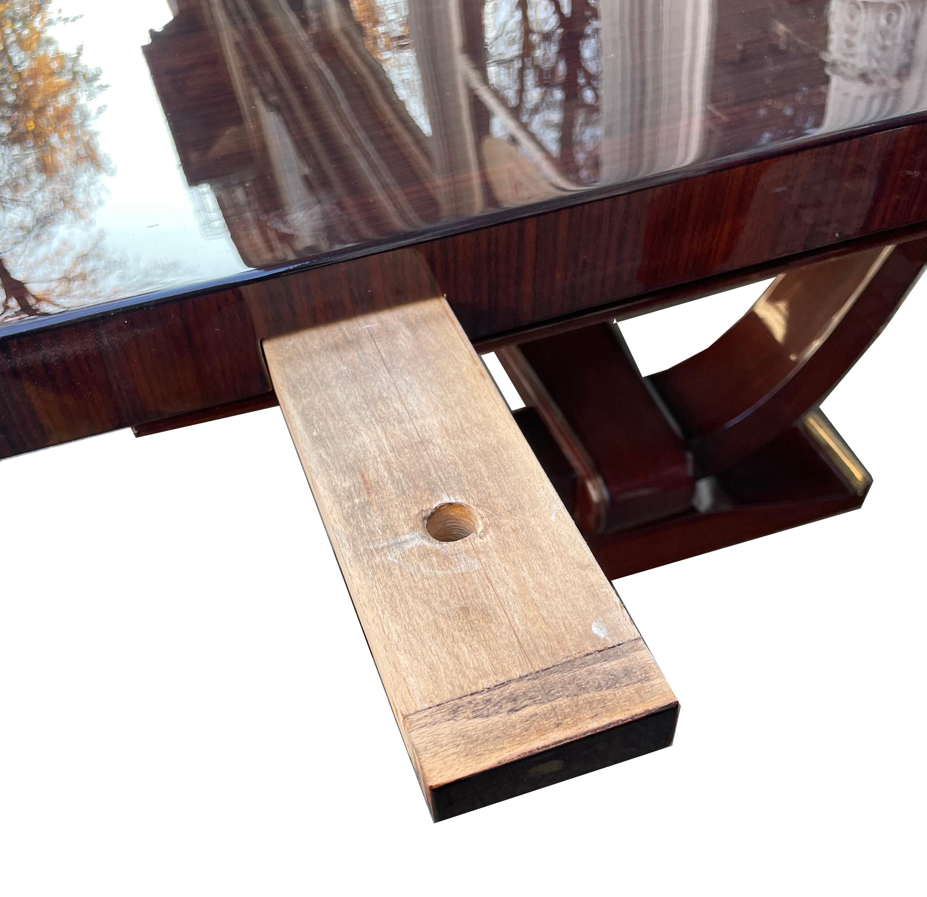 Rosewood Museum-quality Art Deco dining table by “Dominique” For Sale