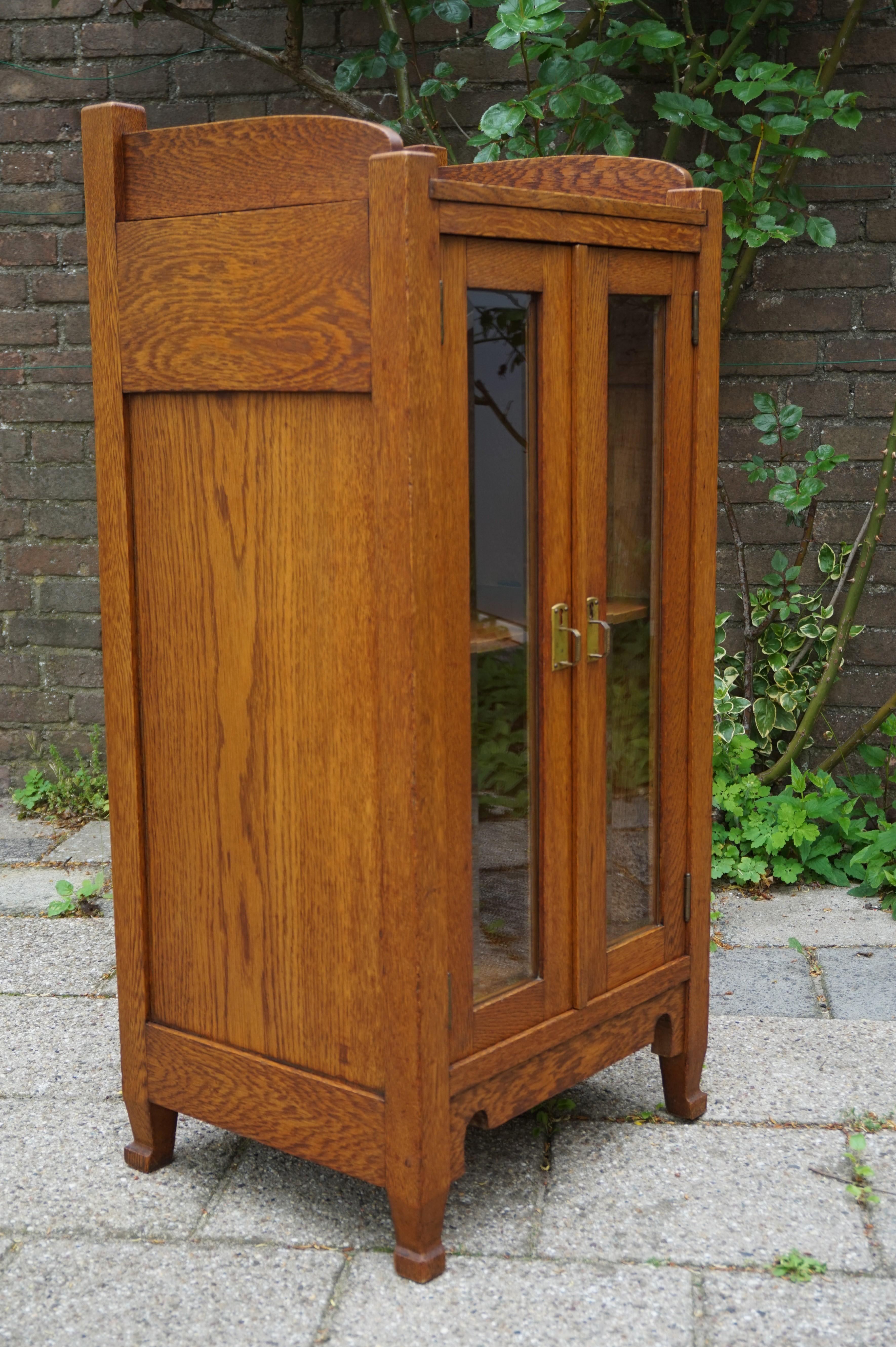 Beautiful and highly practical antique cabinet.

This finest quality and excellent condition cabinet dates back to 1900-1910 and we are certain this is the only one of its kind. This unique antique is entirely made of solid oak and the geometrical