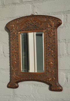 Museum Quality Arts & Crafts Embossed Red Copper and Beveled Glass Wall Mirror