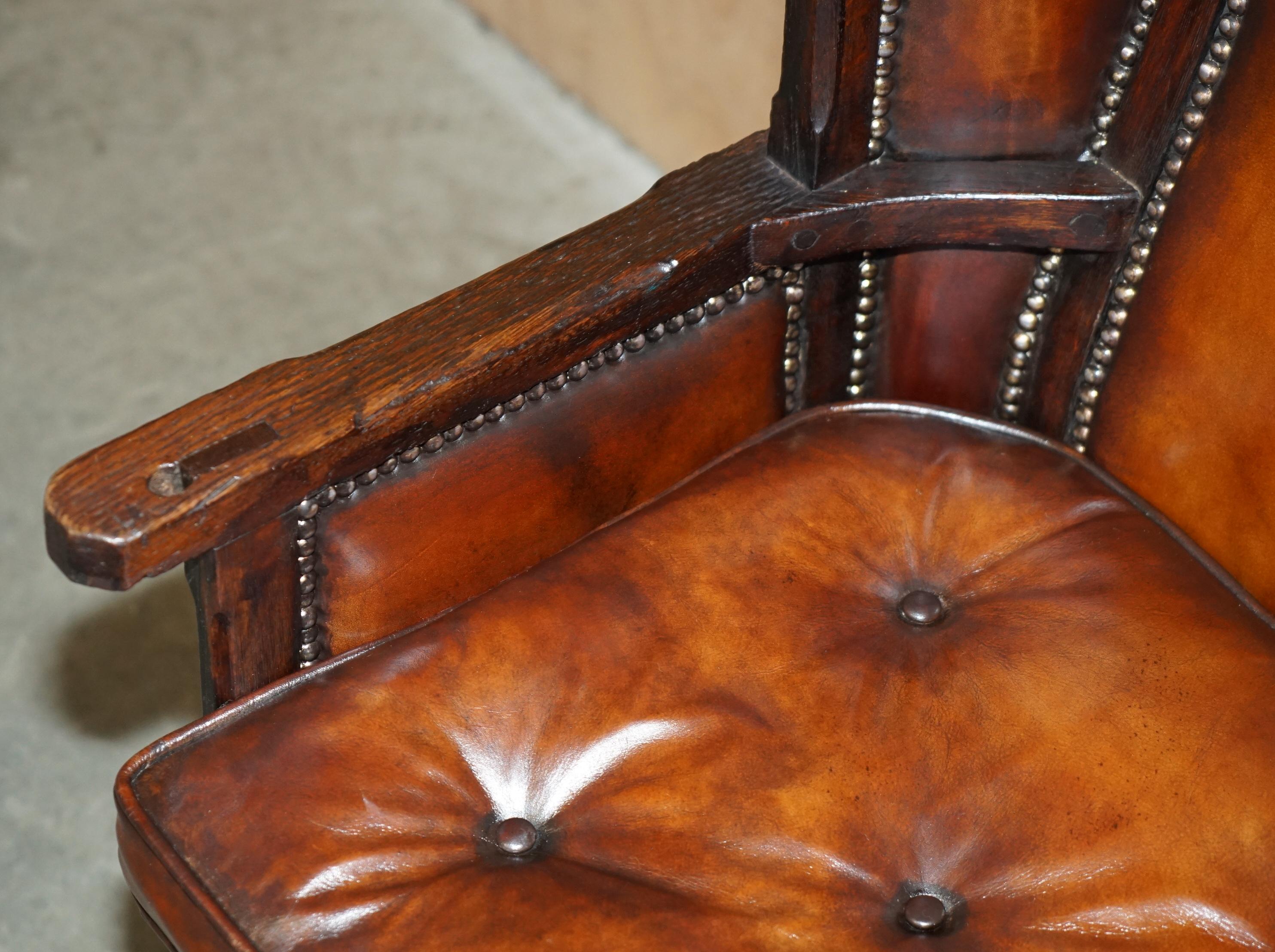 MUSEUM QUALITY CARVED CiRCA 1700 ANTIQUE RESTORED BROWN LEATHER JESSIE ARMCHAIR For Sale 2