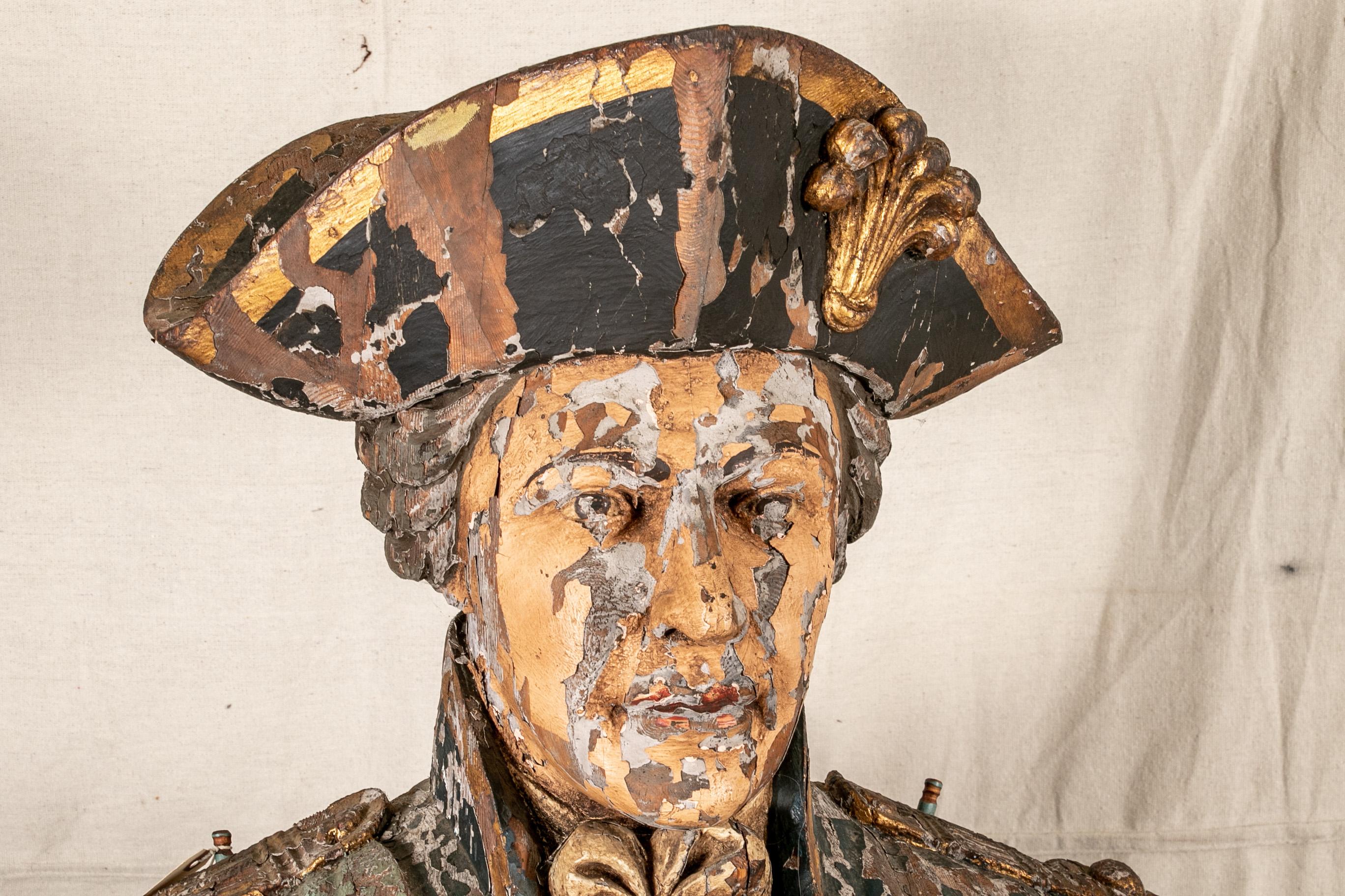 A fine massive and elaborate 18th/19th century English 
 hand carved, geso and paint decorated
ship's masthead of Admiral Horatio Lord Nelson. Traditionally carved in Maritime tradition and having great weight and excellent age/use patina.
Lord