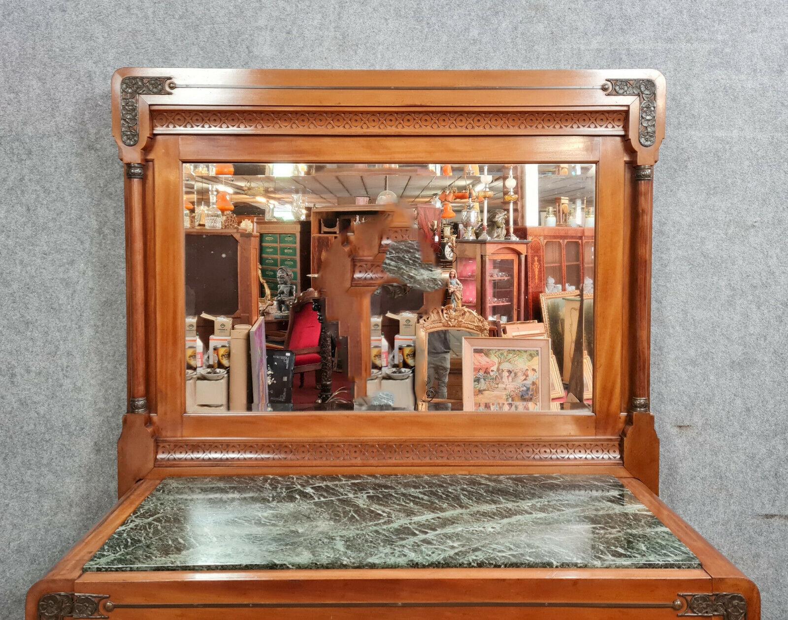 Step into the past with this museum-quality Empire dressing chest featuring a psyche mirror, crafted from blonde mahogany and originating from the late 19th to early 20th century. The chest opens at the front to reveal three drawers adorned with