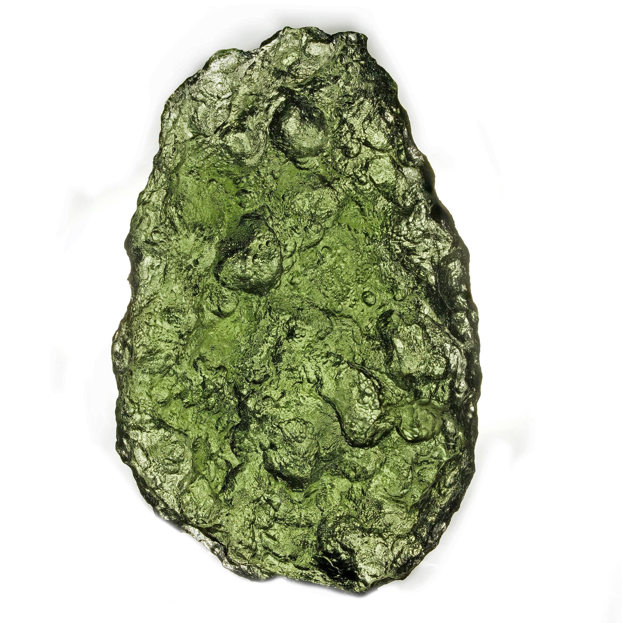 This outstanding 18.6 gram Moldavite specimen exemplifies the finest qualities of this rare tektite, treasured by collectors and institutions alike. Moldavite formed over 15 million years ago during a meteorite impact in what is now the Czech