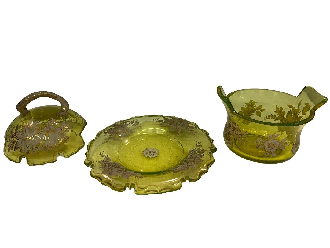 This museum-worthy object is a uranium glass set consisting of a plate, a bowl, and a lid. Made in Bohemia around 1840 during the Biedermeier period.

This glass object is an outstanding piece, not only because it is made of very rare uranium glass