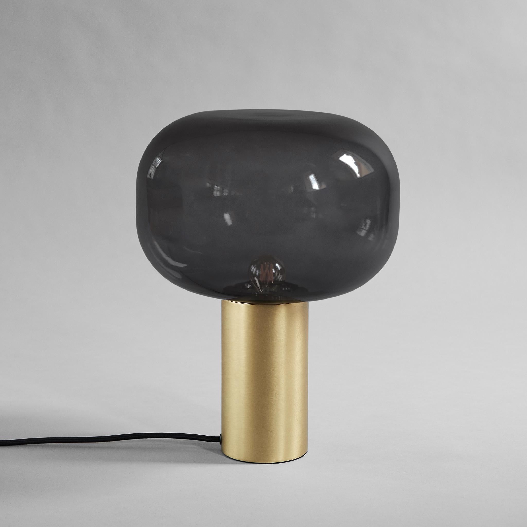 Mushroom floor lamp by 101 Copenhagen
Designed by Kristian Sofus Hansen & Tommy Hyldahl.
Dimensions: L 30 x W 30 x H 35 cm
Cable length: 200 CM

Materials: Brass; Lampbase: 100% Aluminium, with plated brass finish.
Lampshade: Glass /