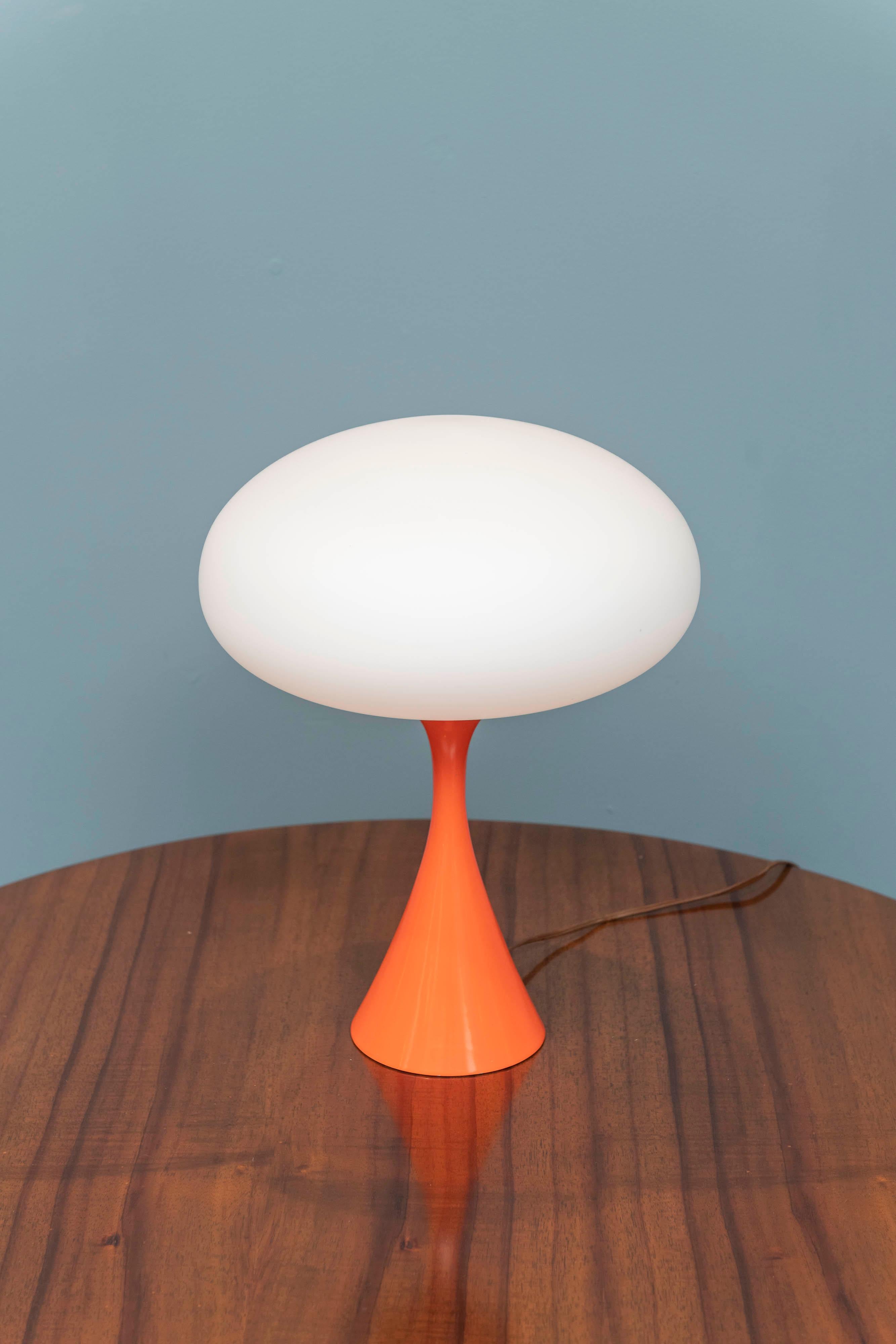 Mushroom form table lamp in a vibrant orange enamel by Laurel Lamp Co., USA.