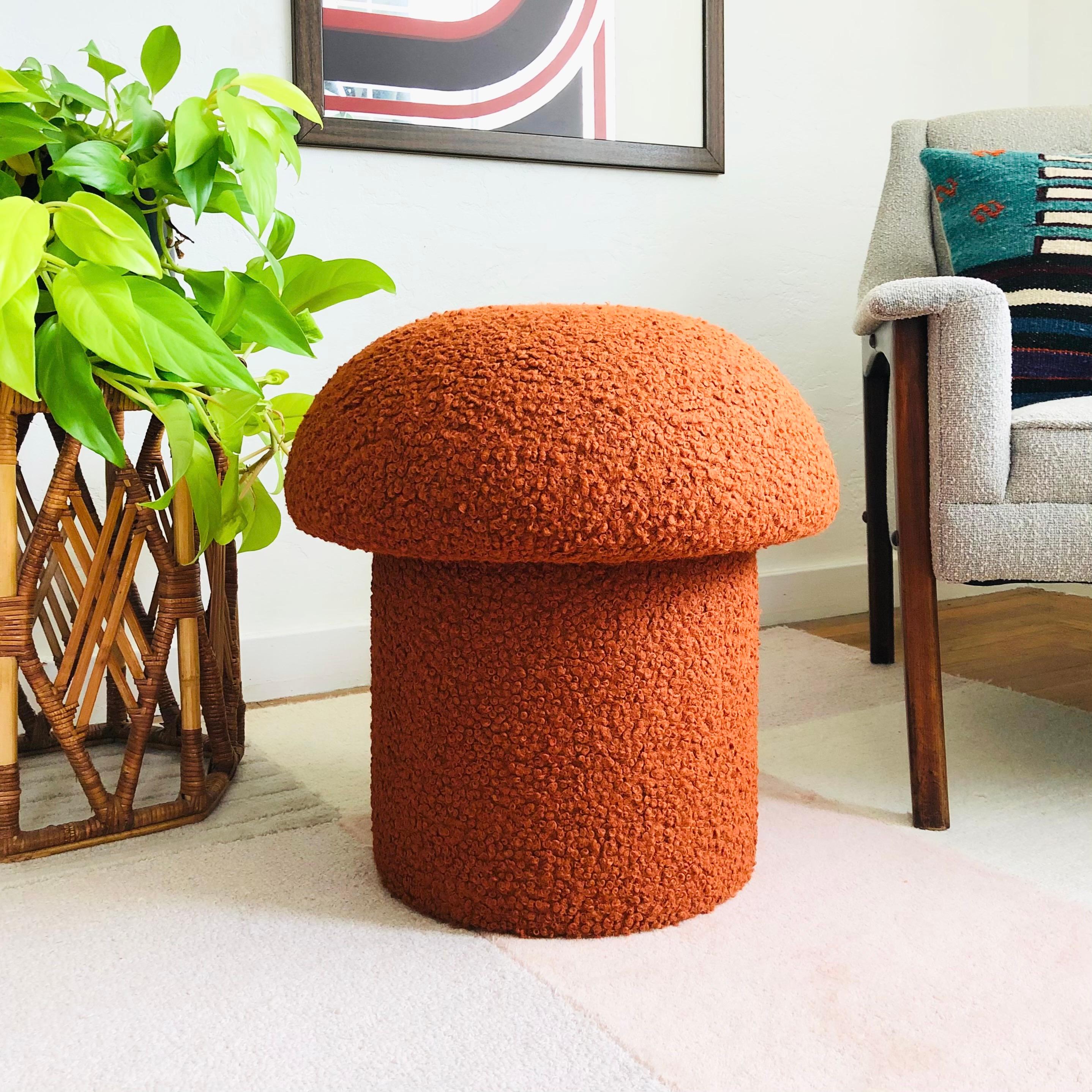 A handmade mushroom shaped stool, upholstered in 