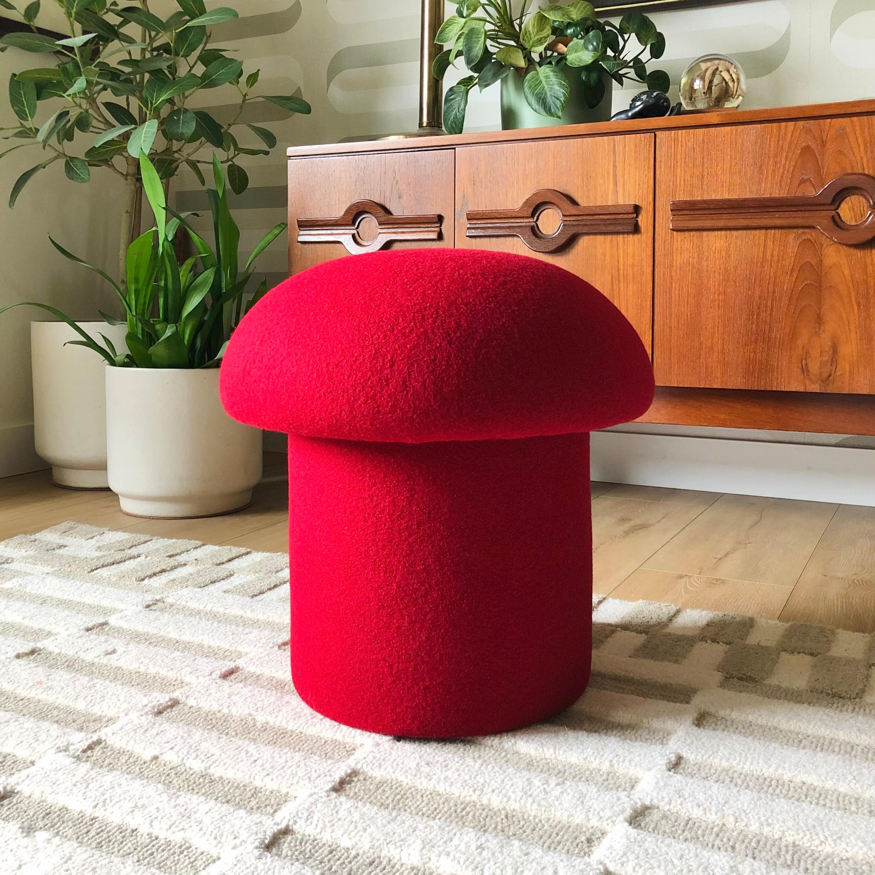 A handmade mushroom shaped ottoman, upholstered in 