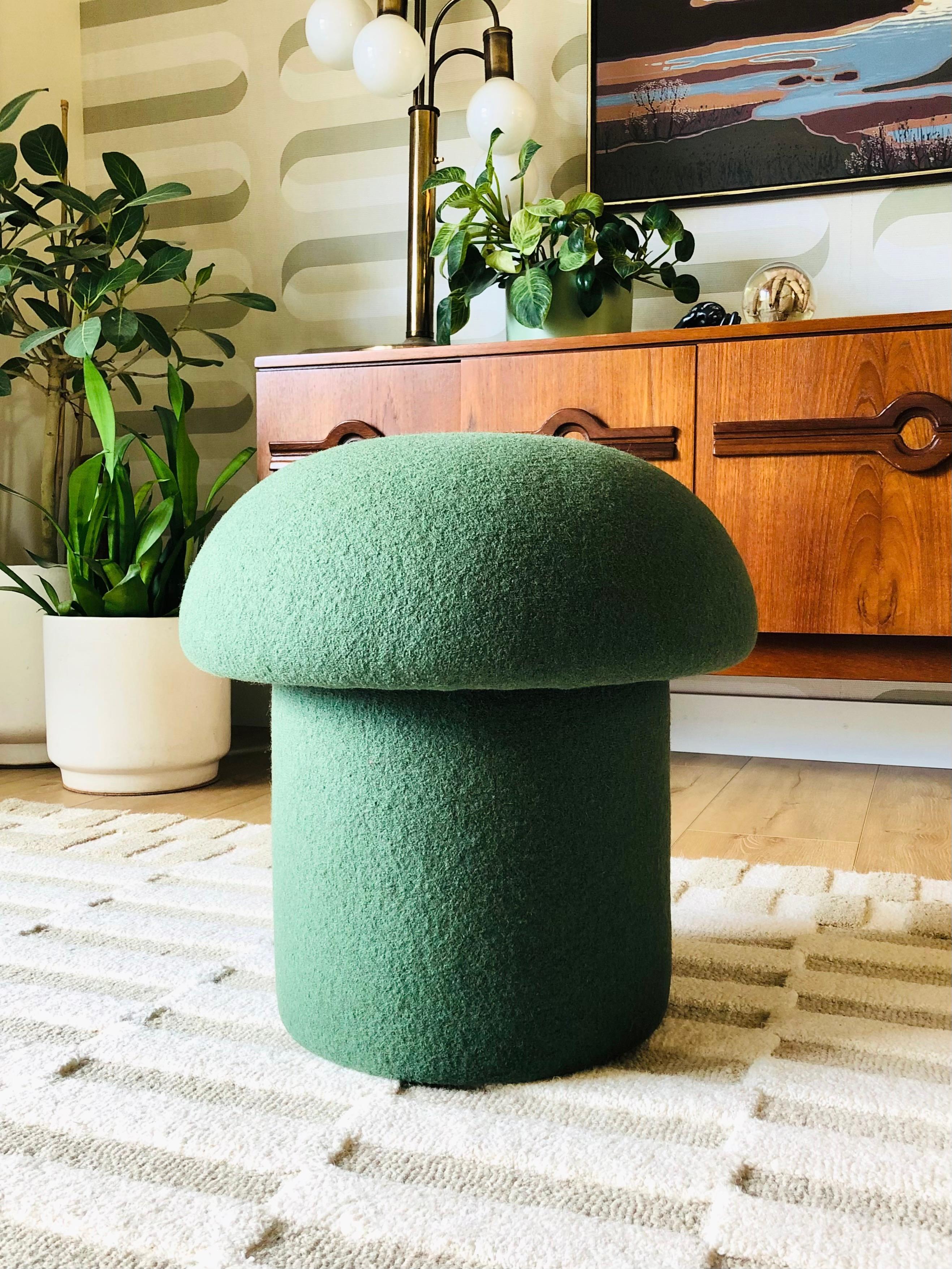 A handmade mushroom shaped ottoman, upholstered in 