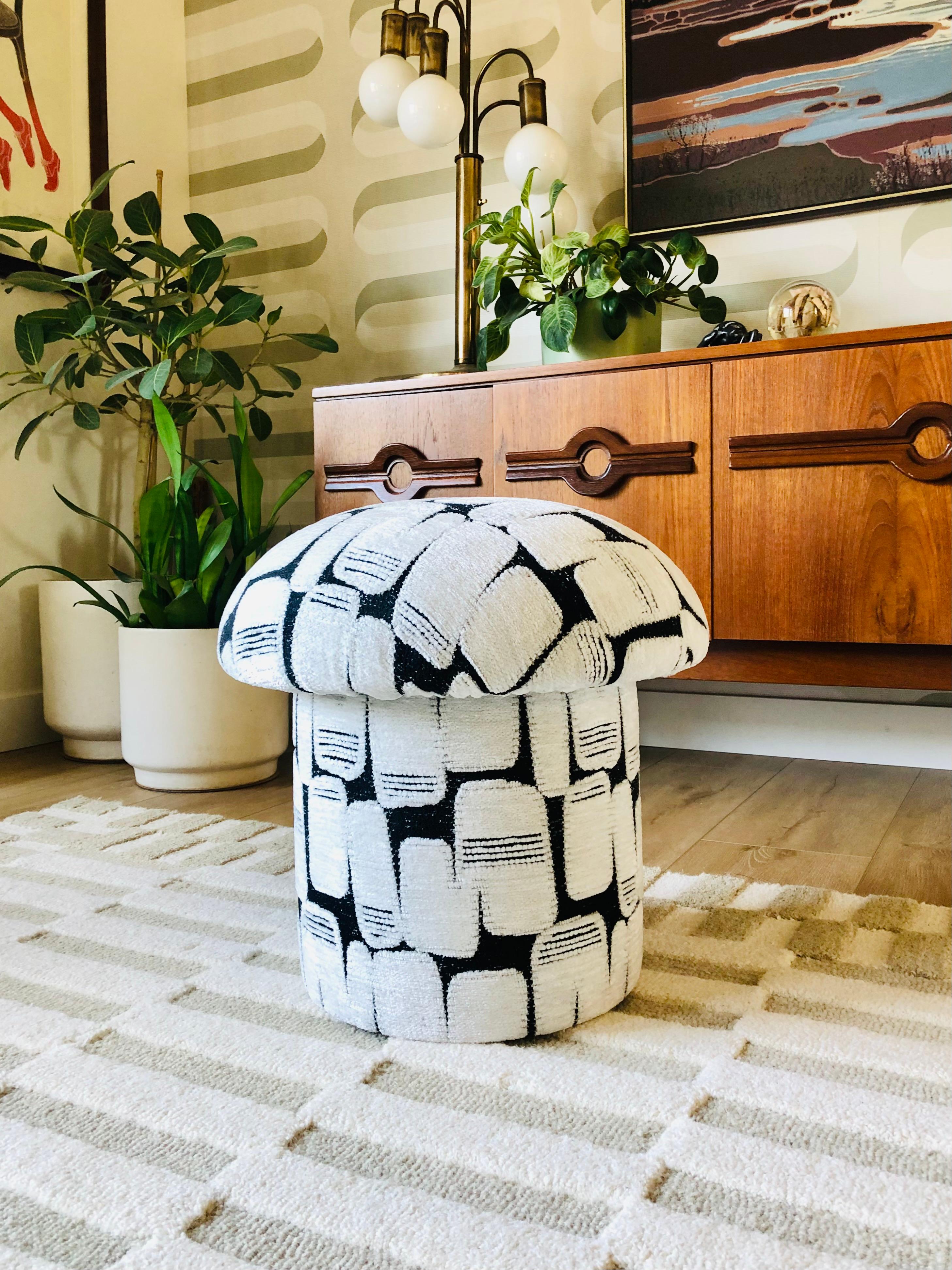 A handmade mushroom shaped ottoman, upholstered in 