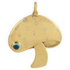 Pendentif champignon avec topaze bleue et diamants en or jaune 14 carats
