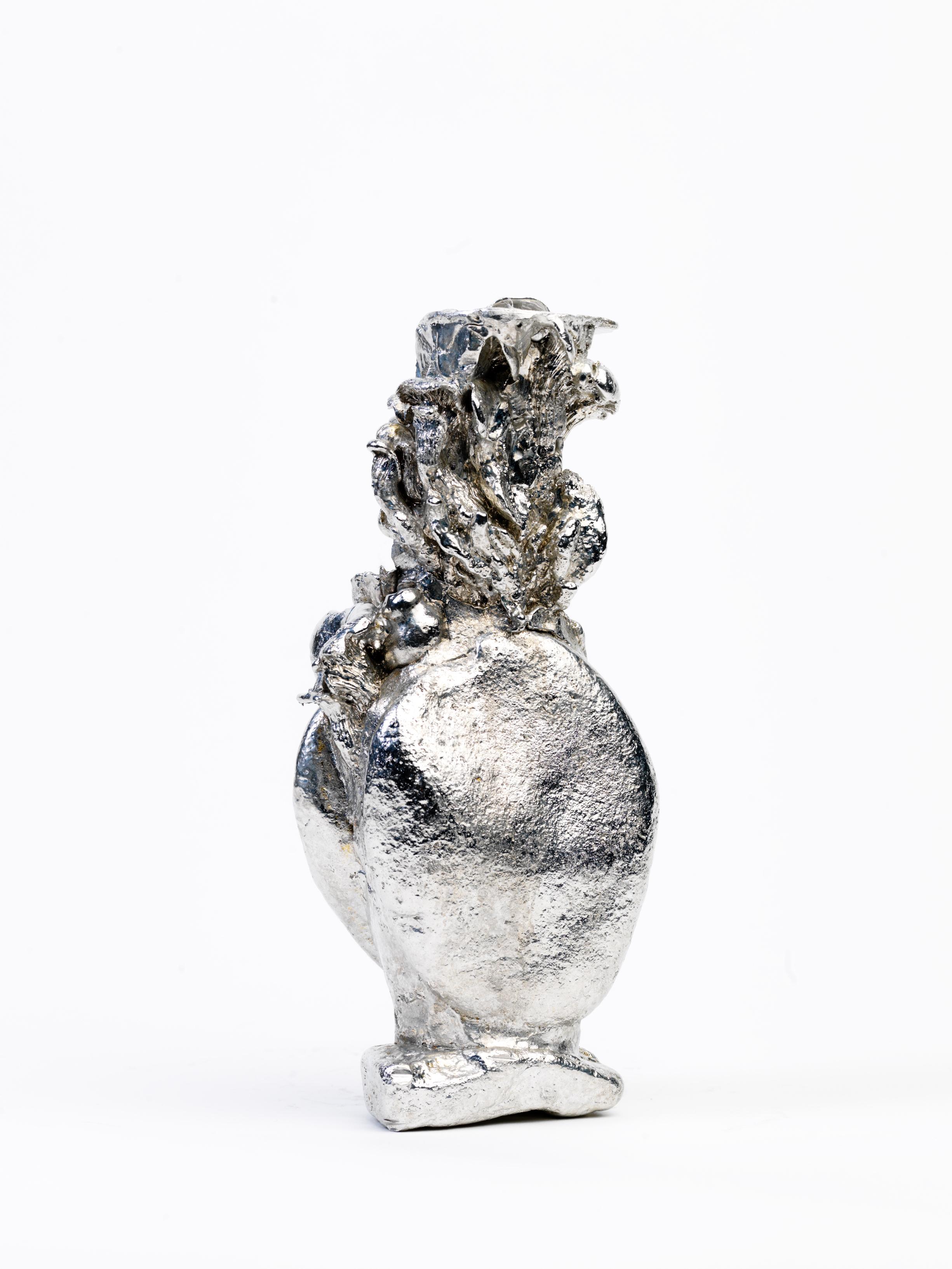 Mushroom pewter vase by Kajsa Willner
Dimensions: 8 x 5.5 x 18.5 cm
Materials: Tin

With ‘Emulate nature’, designer Kajsa Willner has created a series of tin vases aiming to replicate nature both visually and production wise. “In nature, nothing