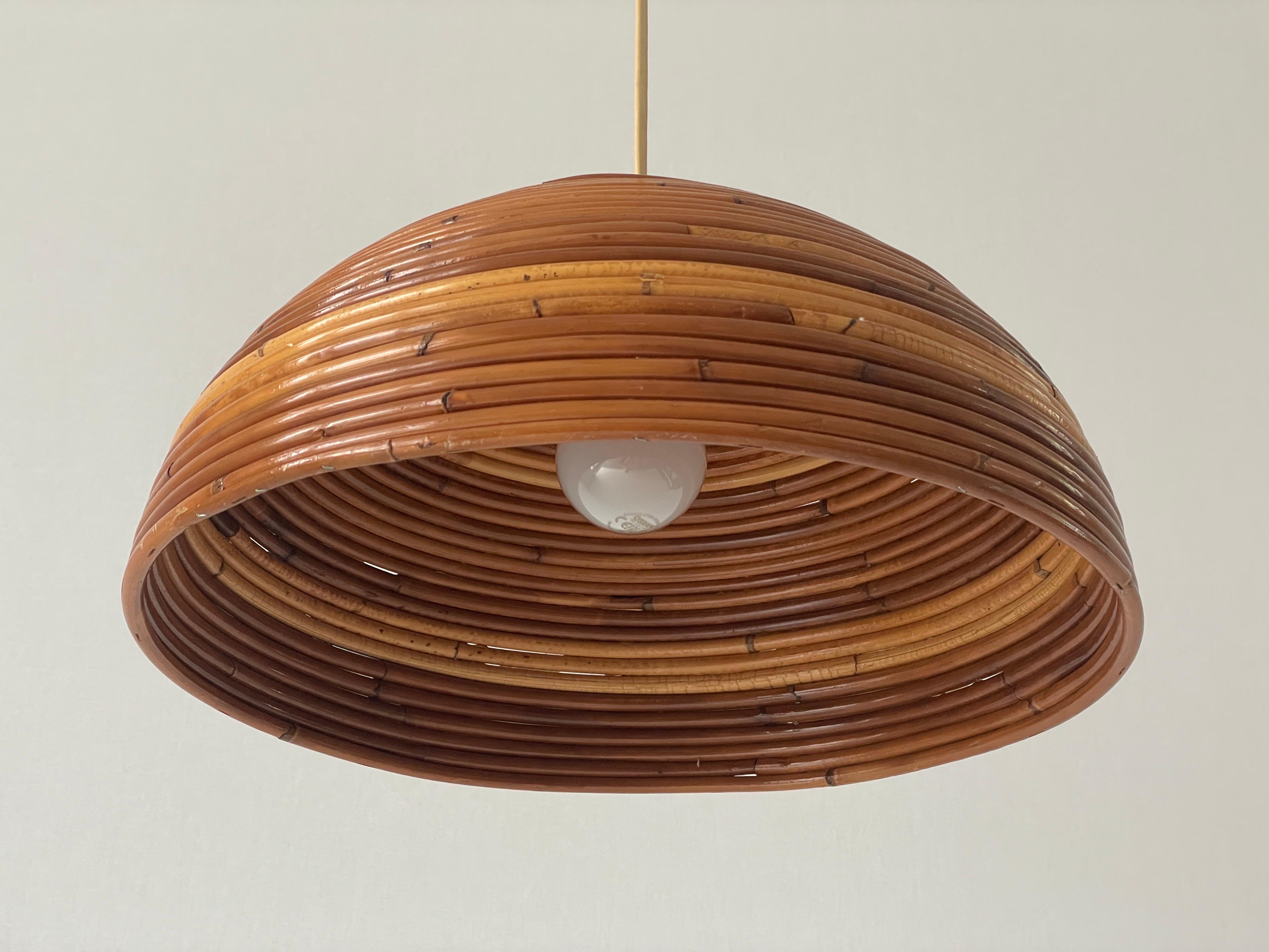 Mushroom Shaped Bamboo Pendant Lamp, 1960s, Germany

This lamp works with E27 light bulbs. 
Wired and suitable to use with 220V and 110V for all countries.

Measurements: 
Height: 90 cm
Shade diameter and height: 38 cm and 20 cm

