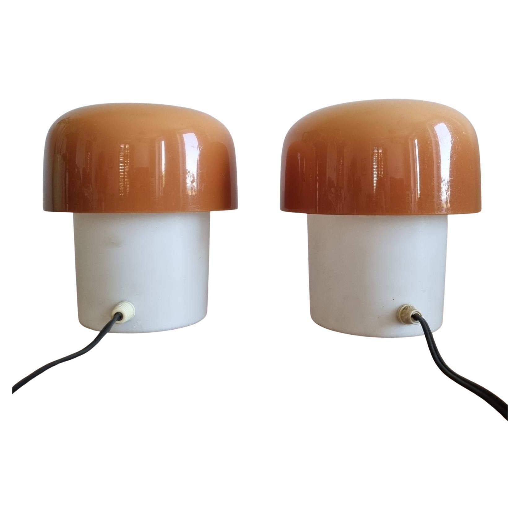 Pair of Mushroom Table lamps designed by Luigi Massoni for Harvey Guzzini  Made by Meblo Yugoslavia in the 70s.

In good vintage condition, with signs of use and age. All visible on pictures. Working perfectly