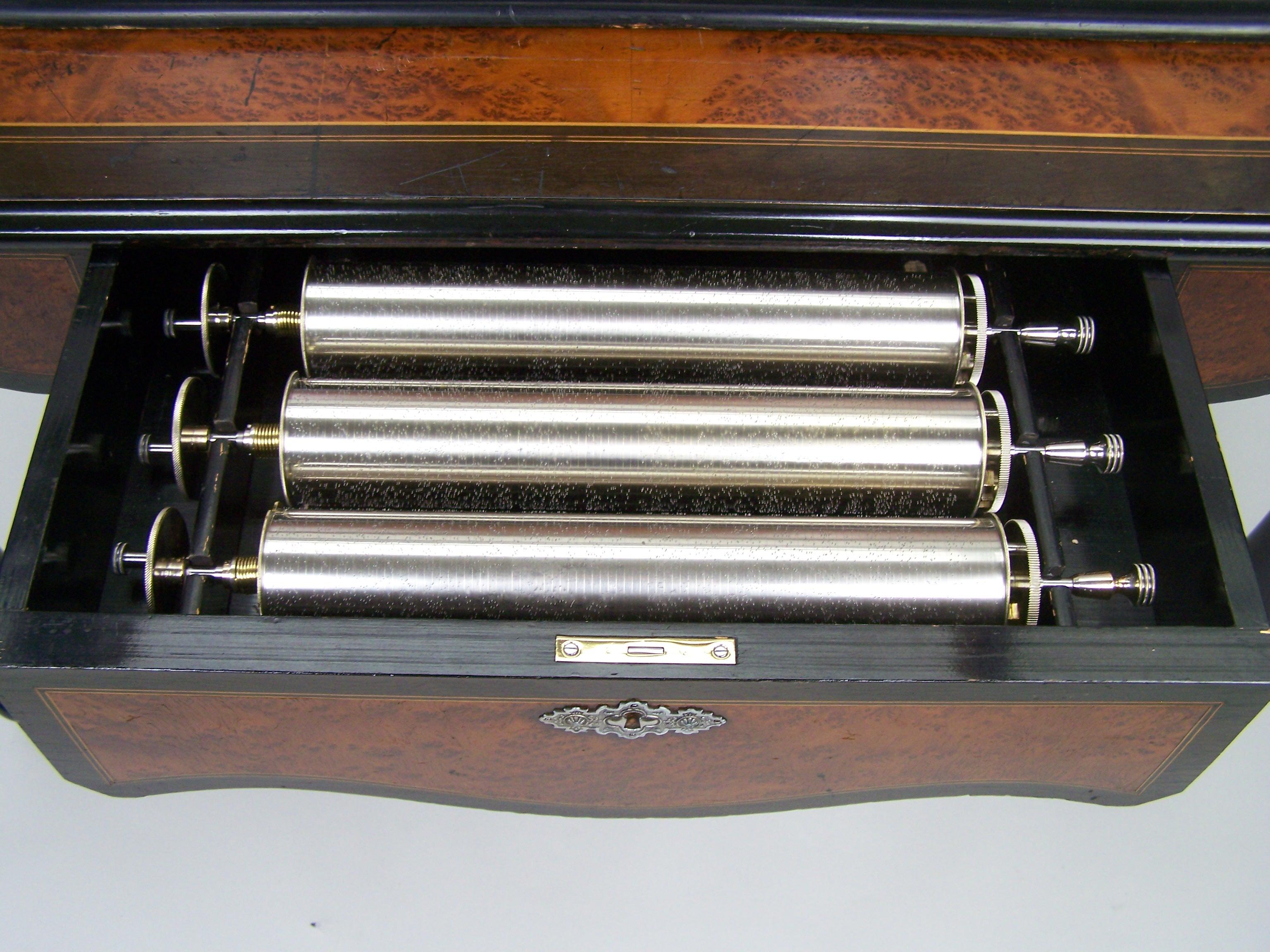 Music box on table with 4 interchangeble cylinders 2