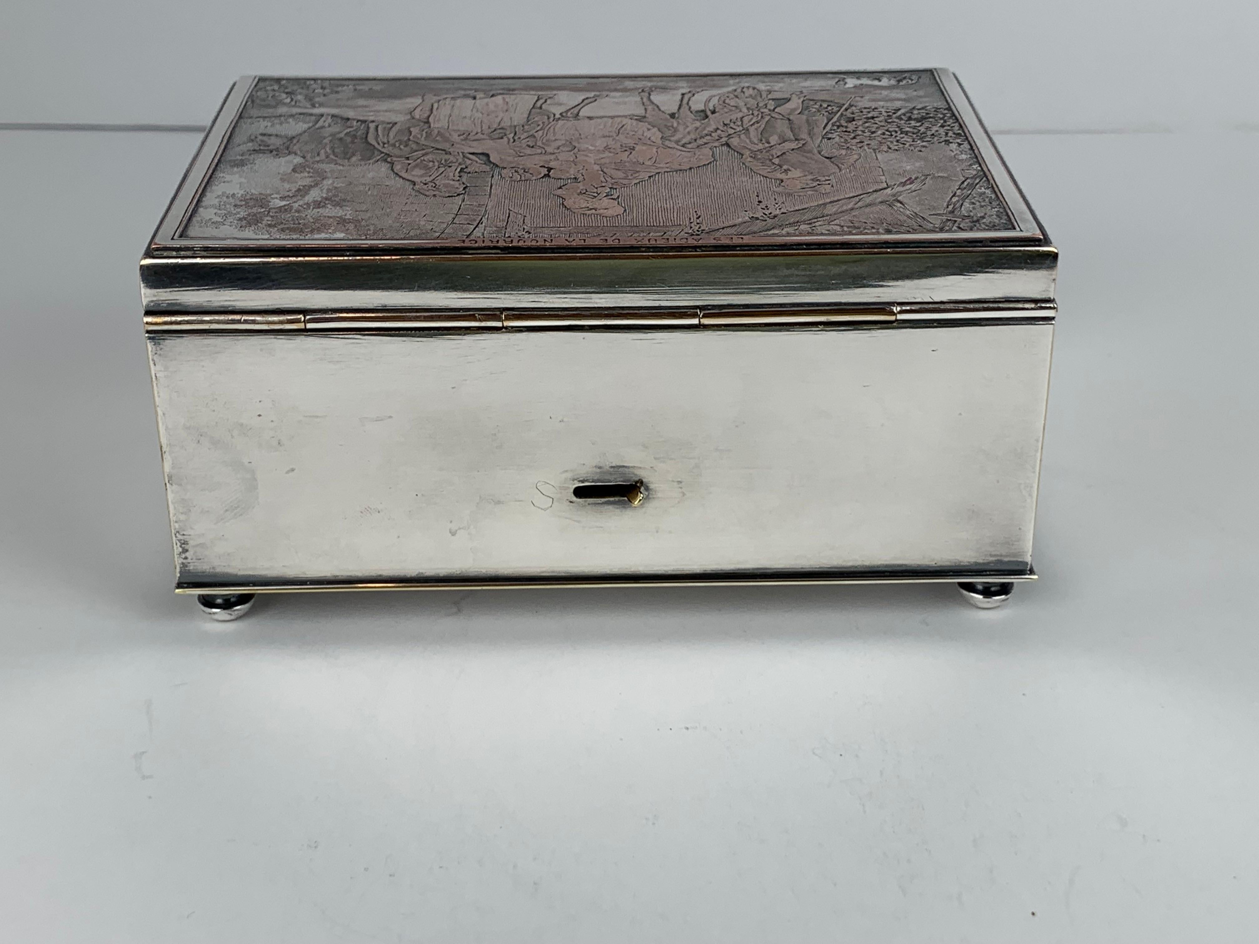 20th Century Silver Engraved Music Box Titled 