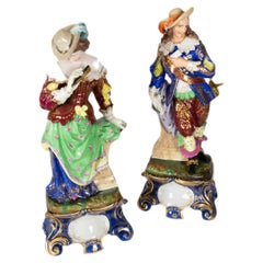 Vintage Musketeer & Lady Porcelain Statues, 20th Century