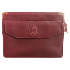 Used Must De Cartier oxblood leather clutch purse 
