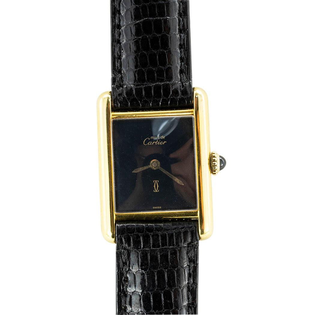 Must de Cartier tank mechanical wristwatch circa 1980. 

ABOUT THIS ITEM:  #W-CJ1821. Scroll down for specifications.  Like so many other Cartier wristwatch designs this tank model has been and remains a favorite classic since its introduction in
