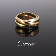 Must de Cartier Trinity Rolling Yellow White Rose Three-Color Gold Band Ring