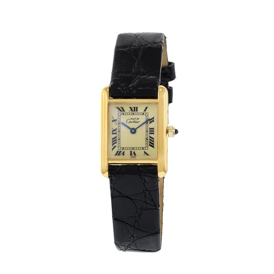 This is a rare Must de Cartier lemon dial sterling silver vermeil tank watch reference 3 66001. The case of this watch measures 20mm in diameter and 28mm lug to lug. The crown has the traditional Cartier cabochon.

This Cartier is powered by an in