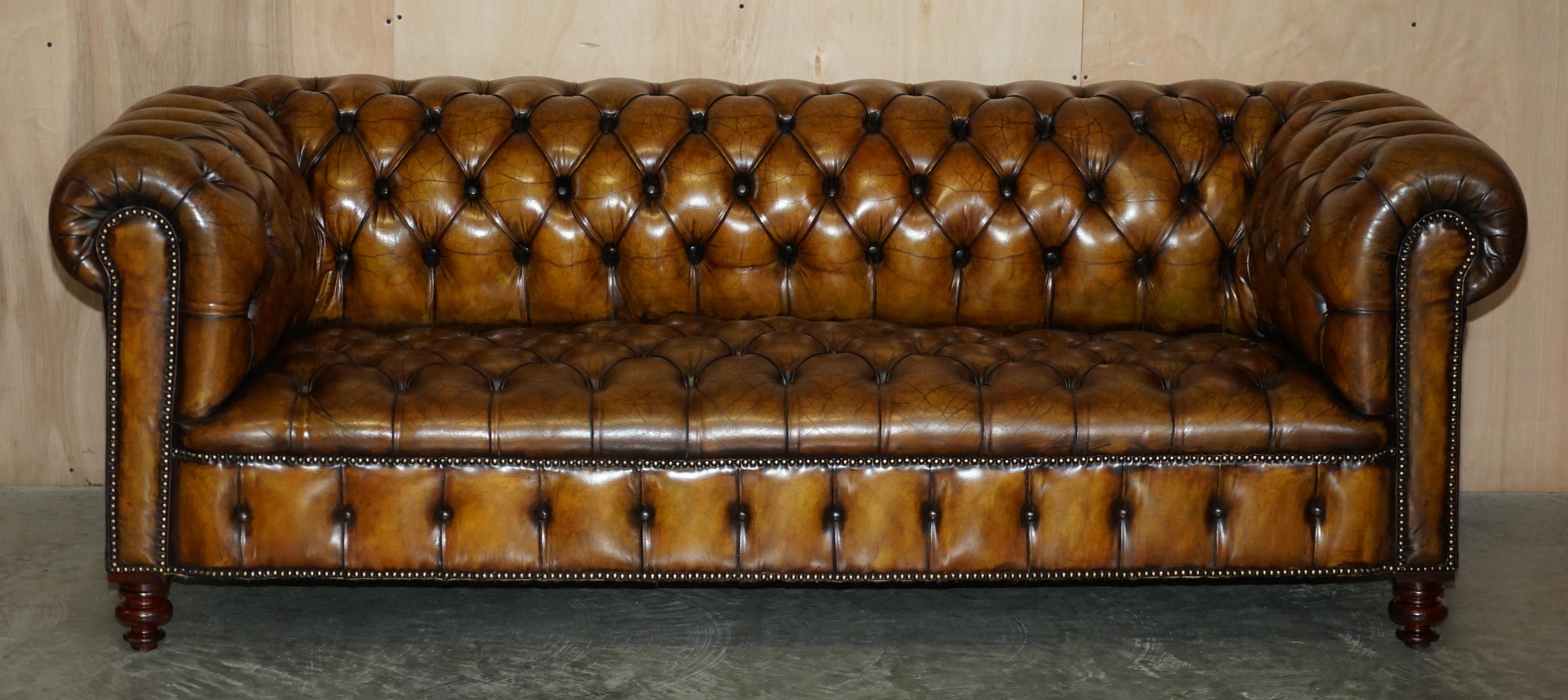 We are delighted to offer for sale this stunning, fully restored, hand dyed cigar brown leather, Antique Victorian circa 1880 Chesterfield club sofa.

This sofa is very unique, it has a wonderful original Walnut turned legs which are solid to the