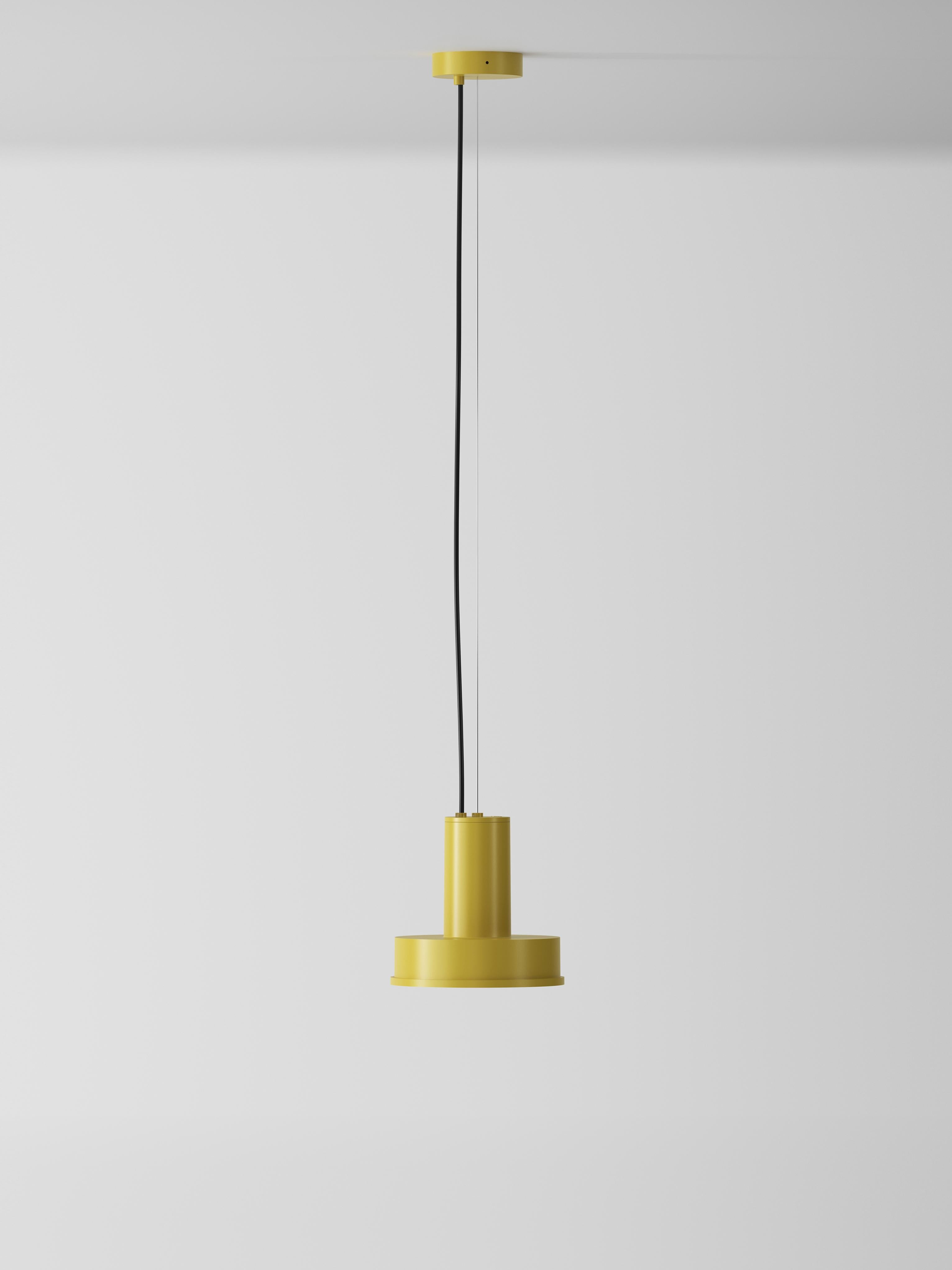 Mustard Arne S Domus pendant lamp by Santa & Cole
Dimensions: D 23 x H 440 cm
Materials: Metal, aluminum.
Available in other colors.

Its aluminium body houses the very best LED technology with a single COB emitter, shielded from view by a
