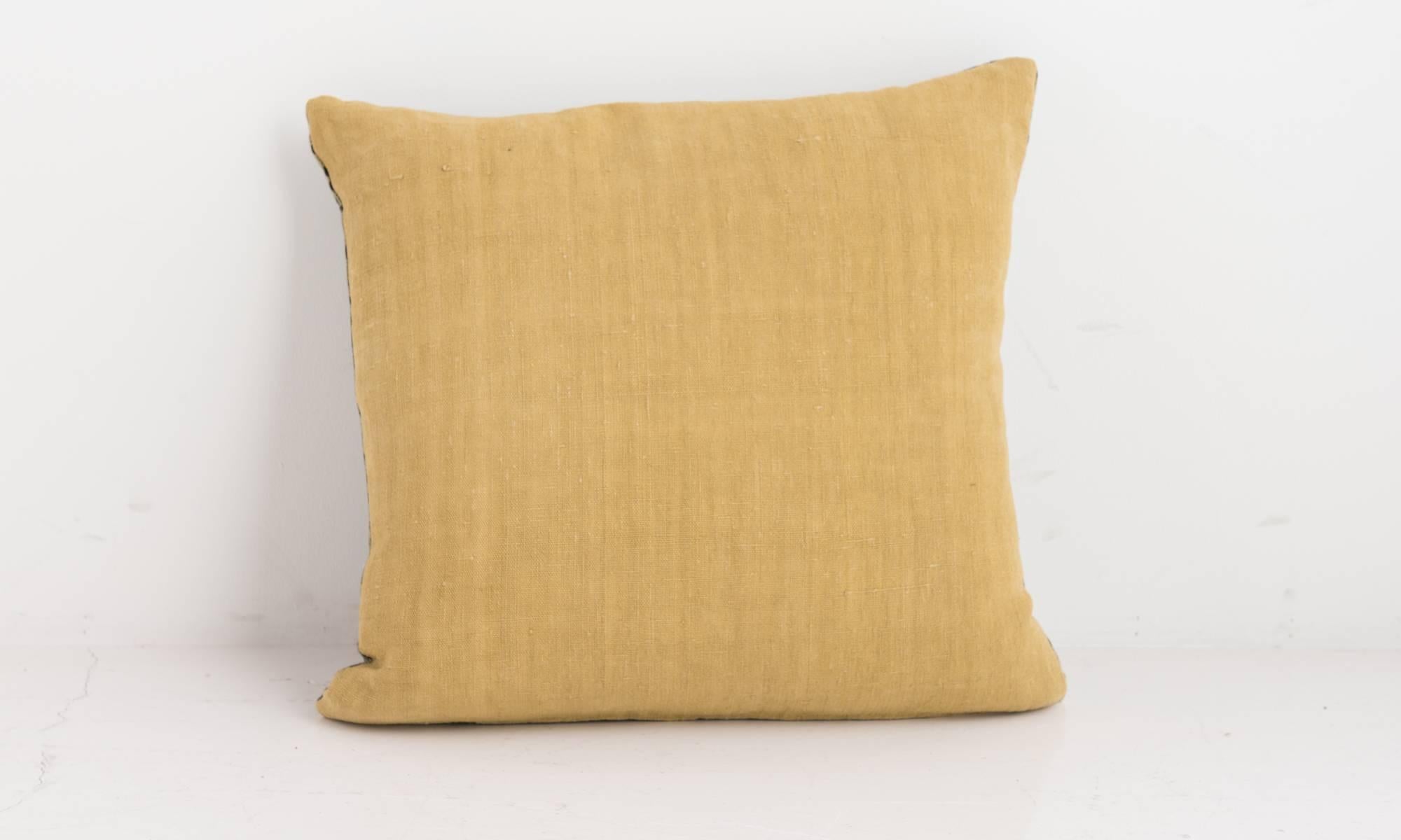 mustard and brown cushions