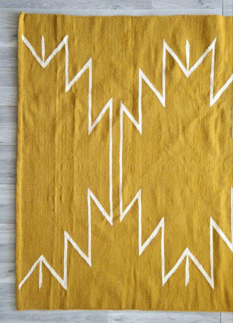 Product Information:
Made of natural wool
Colours: Mustard Yellow, Cream
Designed in Canada 
Handmade in Egypt 
A pad is recommended to prevent slipping




