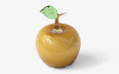 Objet décoratif en verre soufflé de couleur moutarde