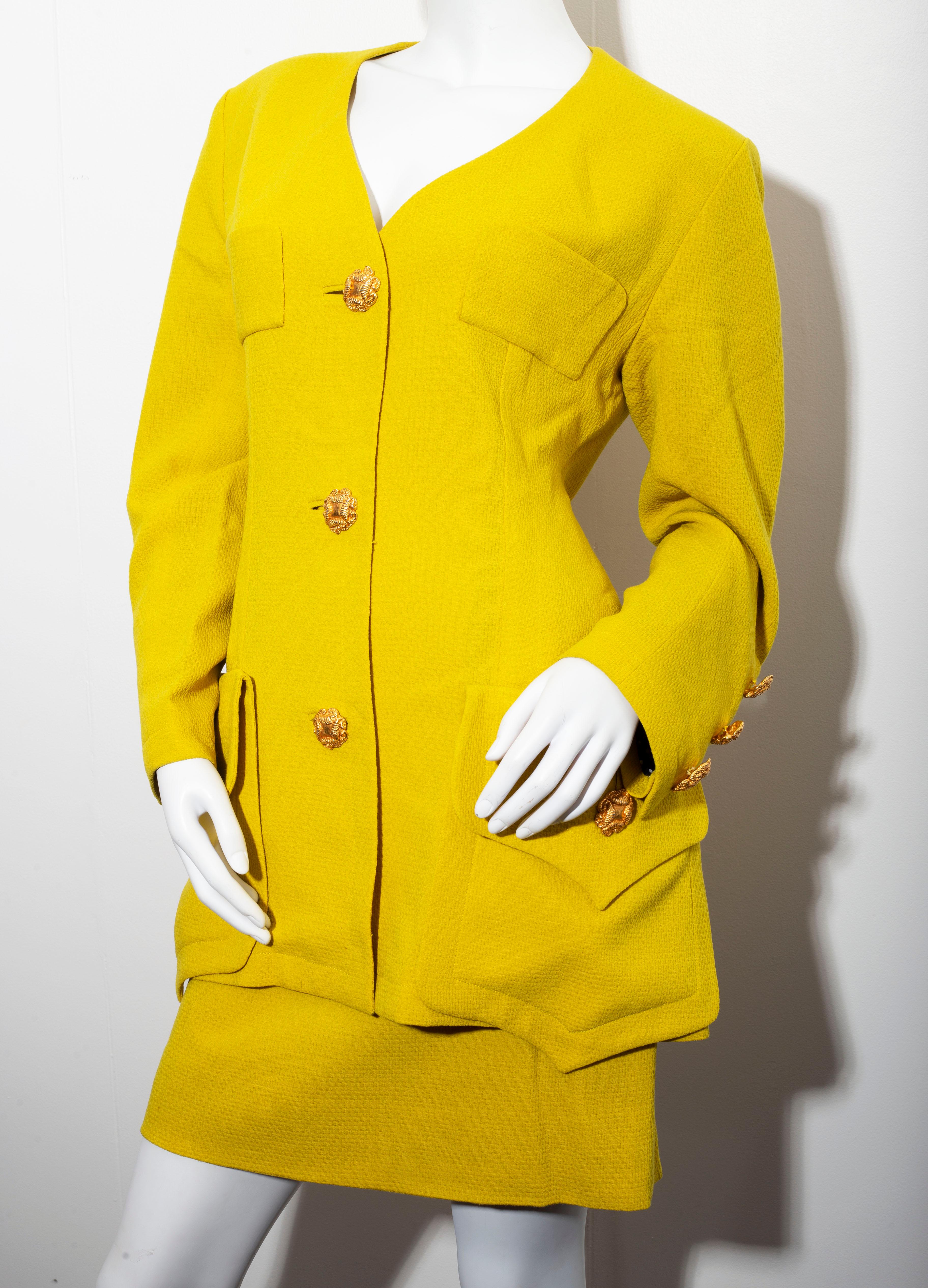 Mustard yellow Christian Lacroix  work suit in freeze wool size 42Christian Lacroix summer polkadot spattern silk inside suit 
Reviving Paris couture, Lacroix used a flouncing, textural mix with a style of theatricality. With his background in