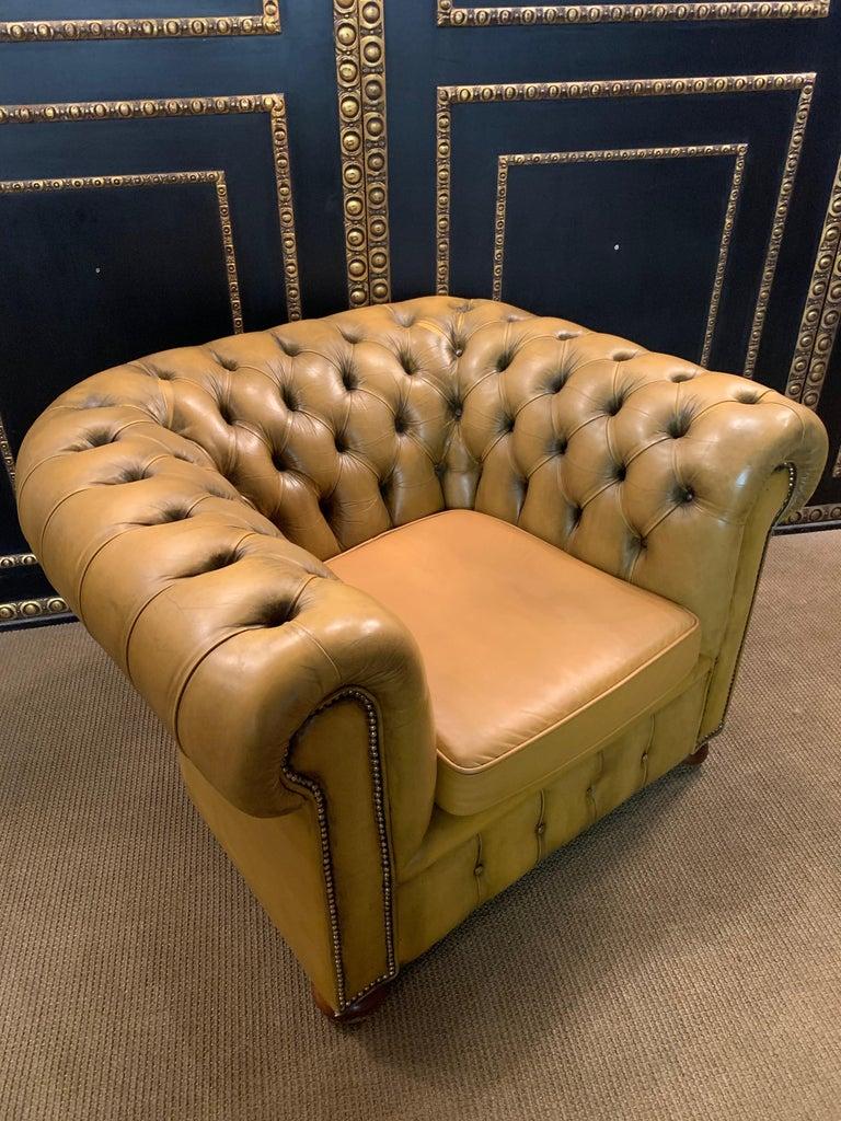 mustard chesterfield chair