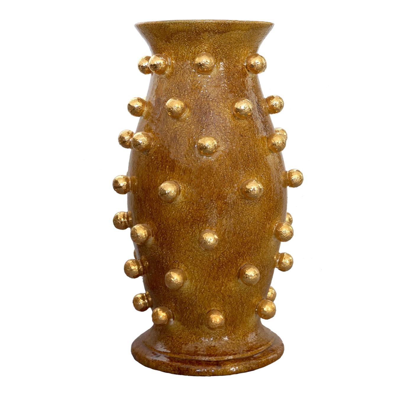 The award-winning Ceramiche ND Dolfi specializes in Majolica pottery. This 2001 handcrafted and turned accent vase in high quality mustard yellow ceramic is enhanced by pure gold spheres all around. Its modern, luxury and attention-grabbing shape is