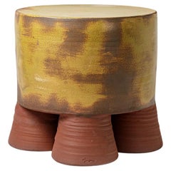 Mustarde, brown and  glazed ceramic  coffee table or stool  by Mia Jensen, 2024.
