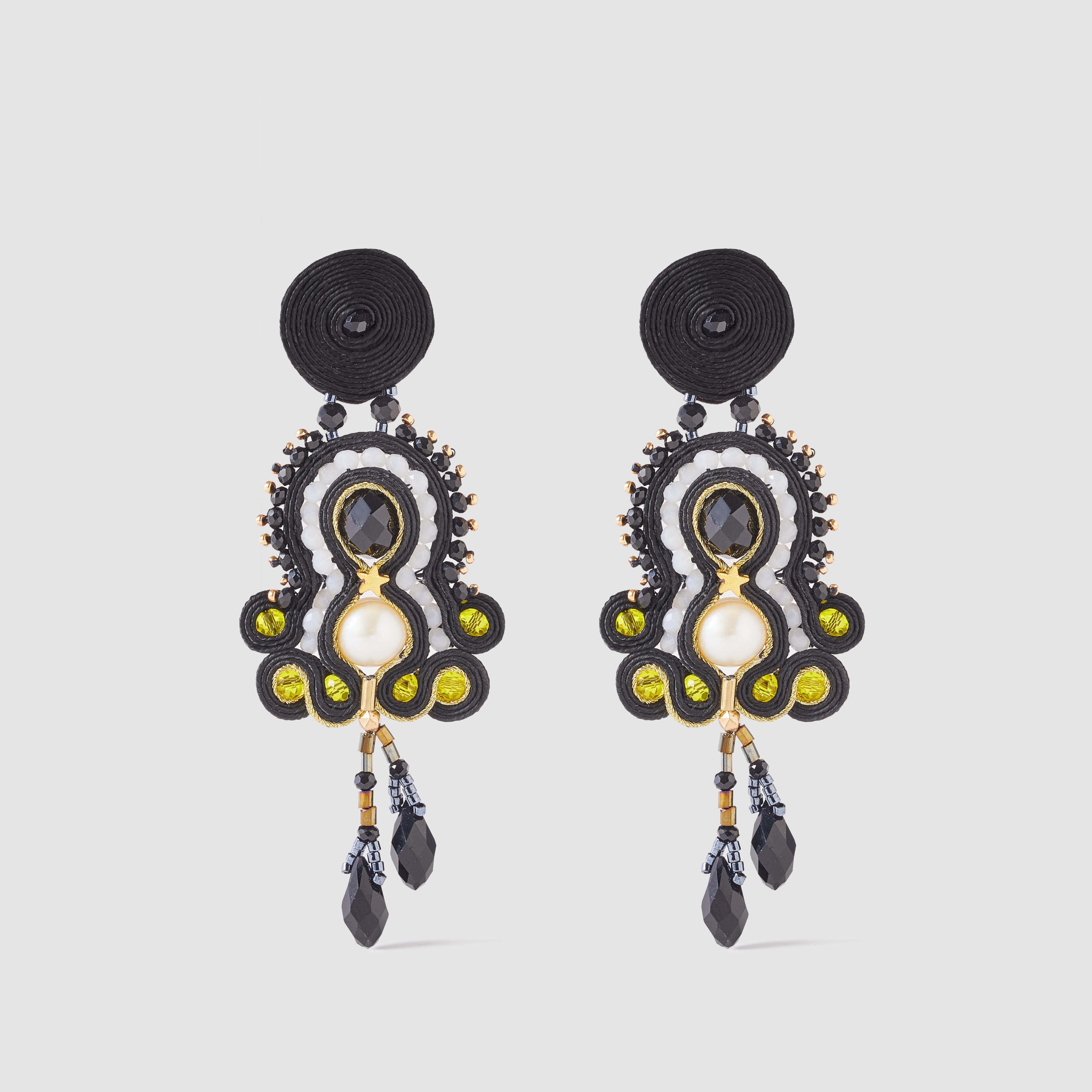 Musula Personalissima Nicoletta Night Soutache Earrings
Soutache earrings made with silk rayon and crystal beads & silver closure

Hand-sewn earrings.
Rayon yarn 2mm.
River pearls, hematite and glass beads.
Silver nut XL
Length 9cm 
Ultralight,