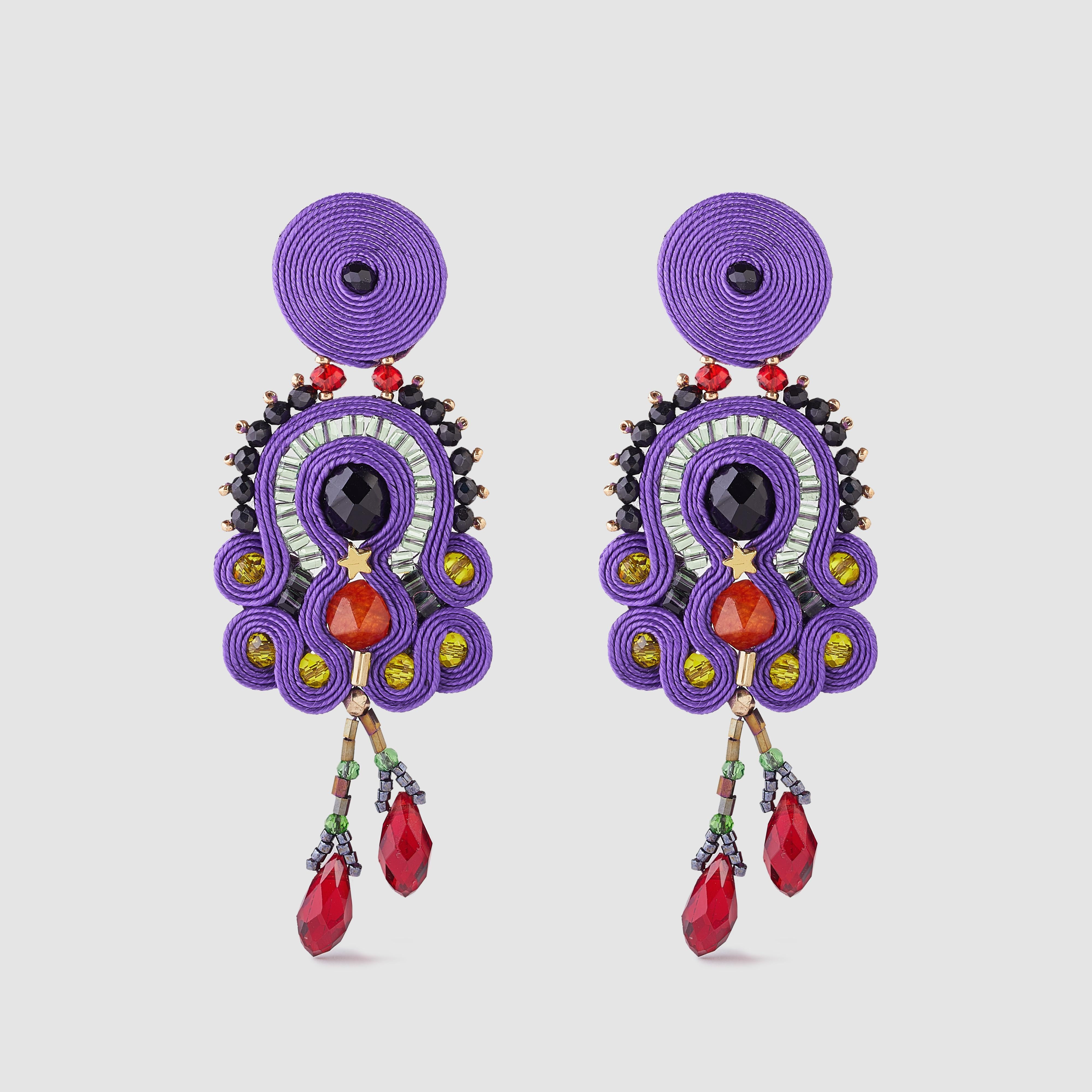 Musula Personalissima Nicoletta Night Soutache Earrings
Soutache earrings made with silk rayon and crystal beads & silver closure

Hand-sewn earrings.
Rayon yarn 2mm.
Carnelian, hematite and glass beads.
Silver nut XL
Length 9cm 
Ultralight,