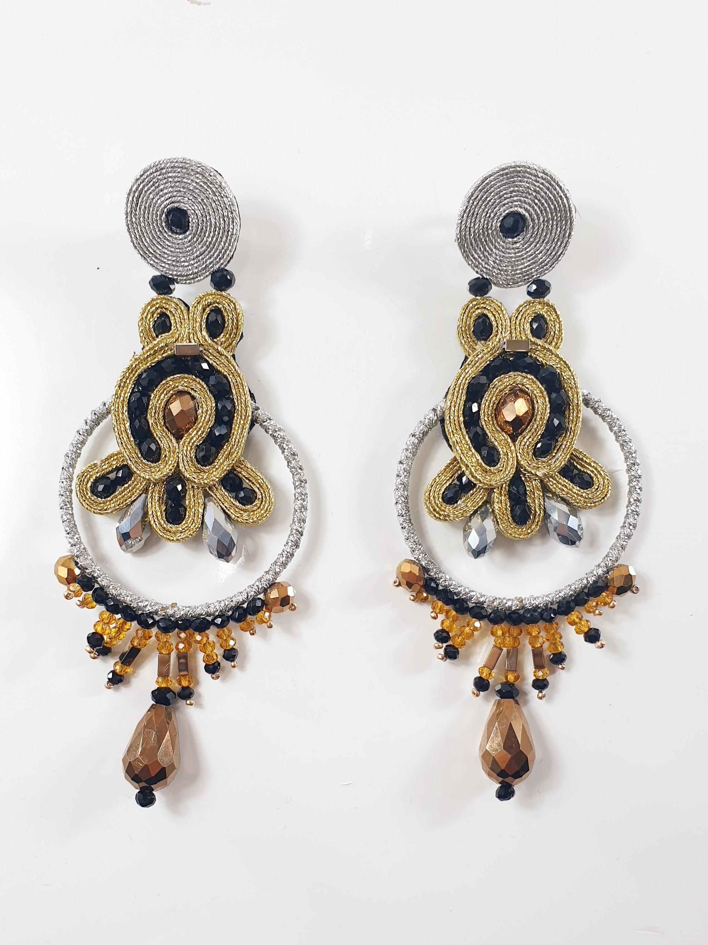 Musula Urban Silver Opera Earrings
Urban Collection is a special homage to sweet lovers.
Soutache earrings made with rayon 2mm, hematites and crystal beads. 
Silver clips lenght 10cm 3.94inches. 
Back finish in natural smooth and thin