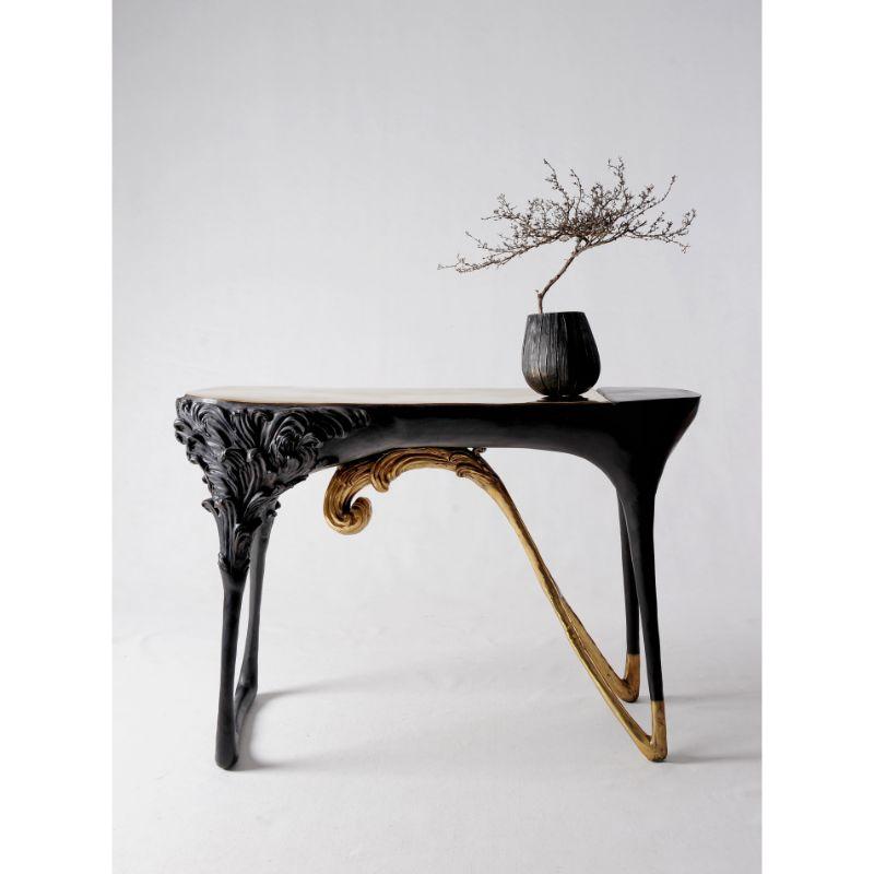 Mutation console by Masaya
Dimensions: W 118 x D 44 x H 80 cm
Materials: Brass

Also available: Different colors (gold, polished brass. black, painted brass) and materials ( wood, marble, or glass tops)

MASAYA is our brand’s collection which